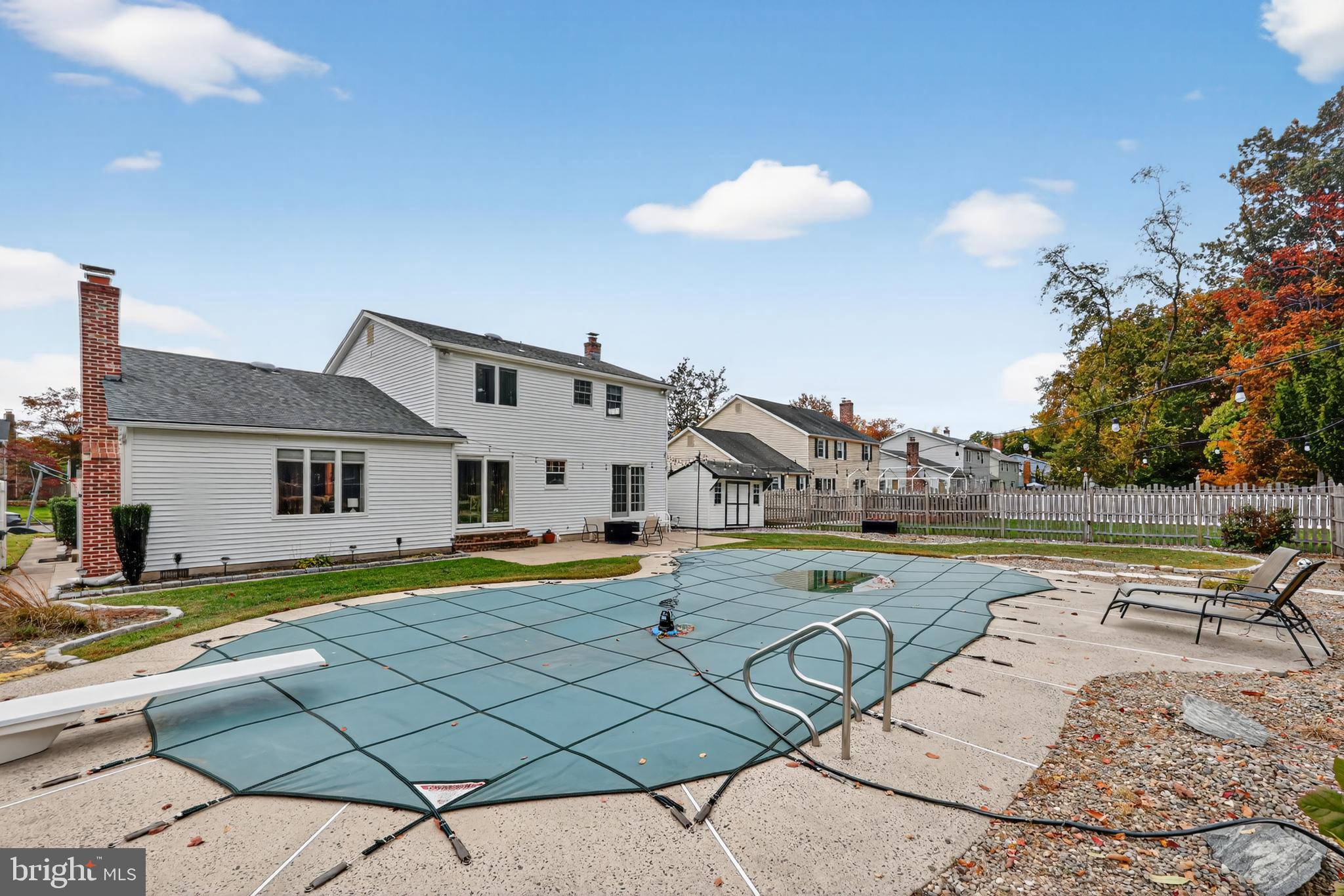 665 Chatham Road Somerdale, NJ 08083 - Photo 34 of 36 a view of a house with pool and a yard