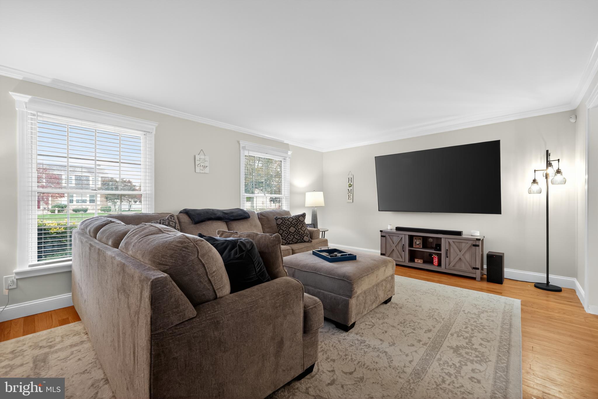 665 Chatham Road Somerdale, NJ 08083 - Photo 4 of 36 a living room with furniture and a flat screen tv