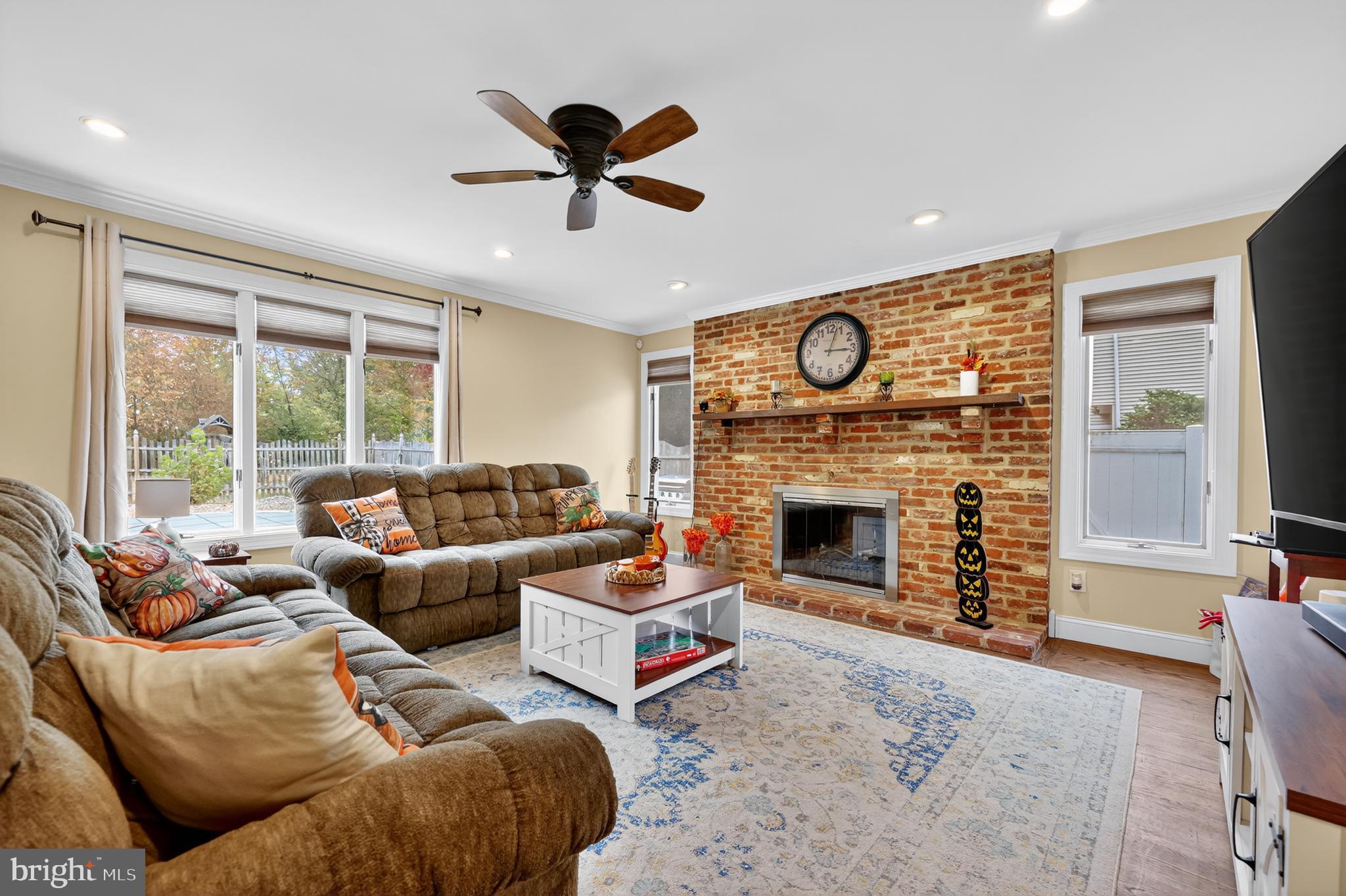 665 Chatham Road Somerdale, NJ 08083 - Photo 7 of 36 a living room with furniture and a fireplace