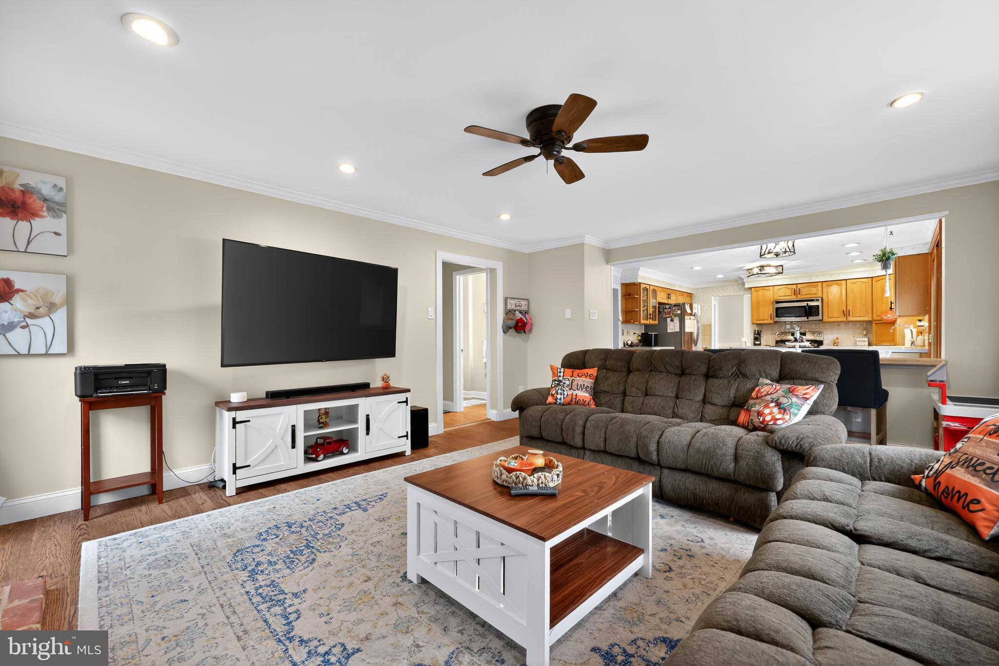 665 Chatham Road Somerdale, NJ 08083 - Photo 9 of 36 a living room with furniture and a flat screen tv