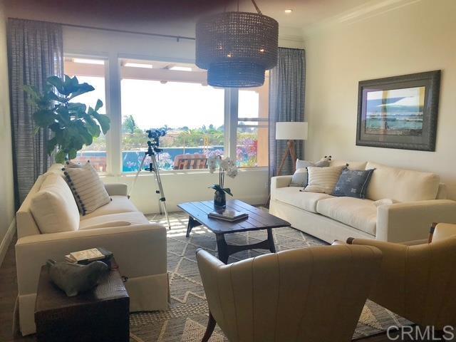 542 Hidden Ridge Court Encinitas, CA 92024 - Photo 3 of 3 a living room with furniture and a large window