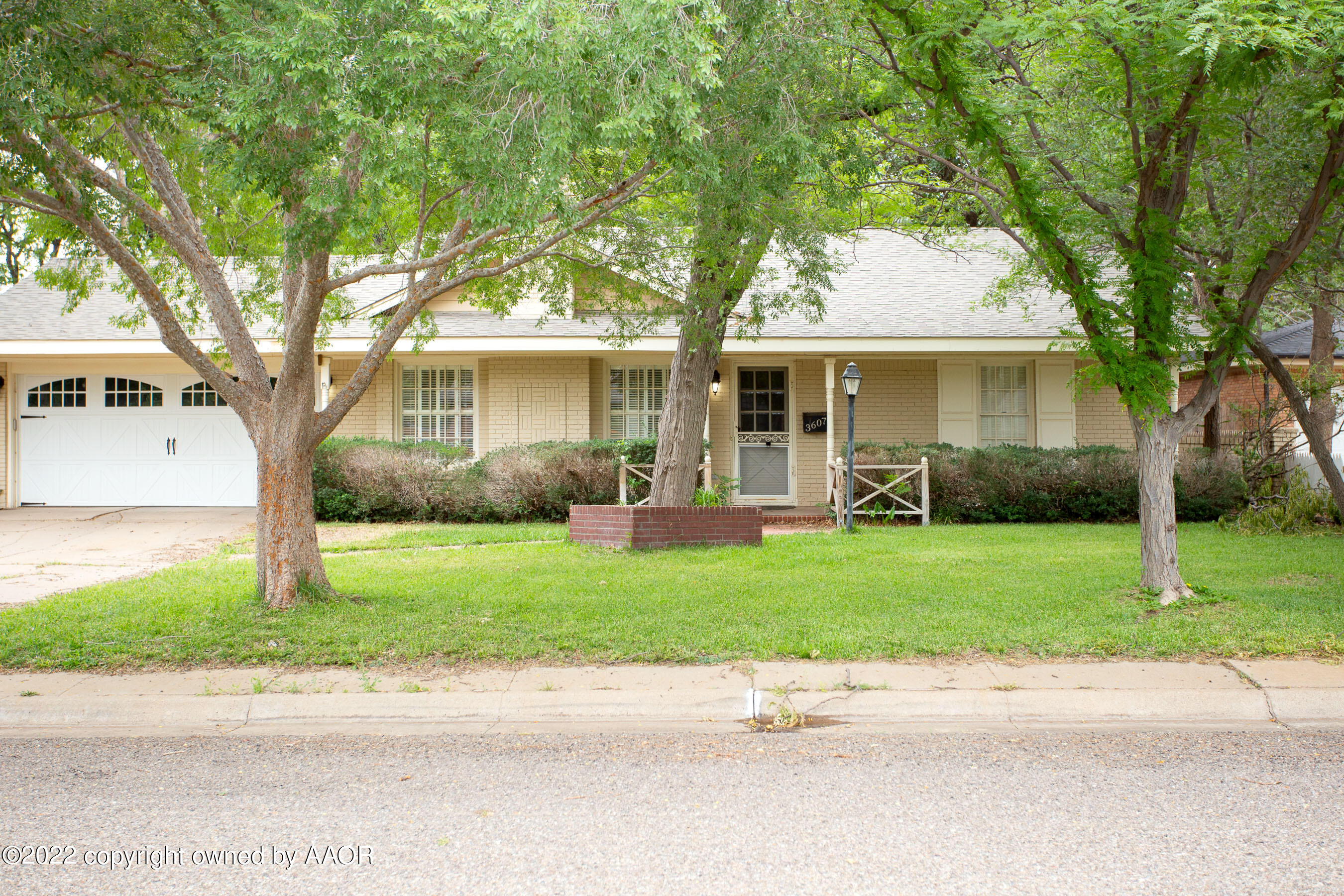 3607 Patterson Drive Amarillo, TX 79109 - Photo 2 of 24 a front view of house with yard and green space
