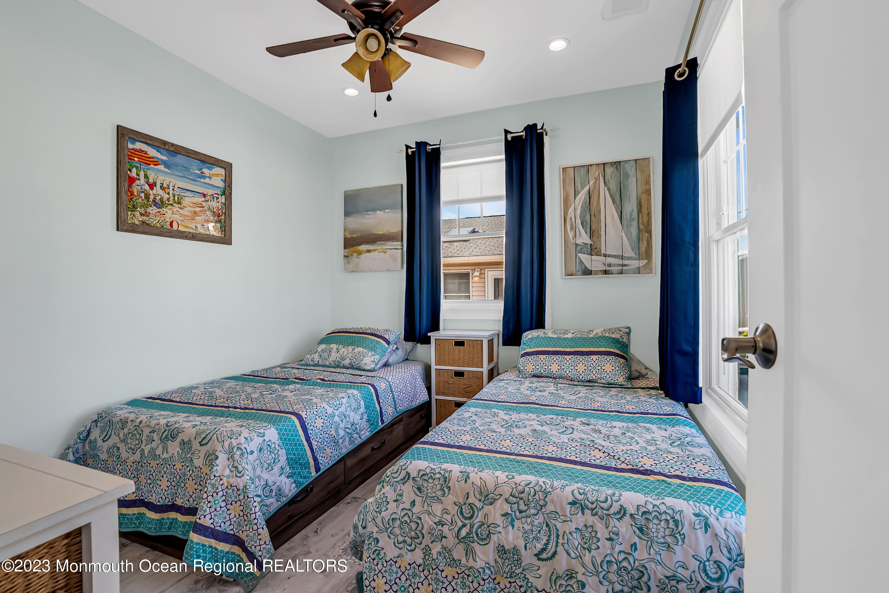 26 East Shell Way Lavallette, NJ 08735 - Photo 14 of 46 a bedroom with a large bed and a window
