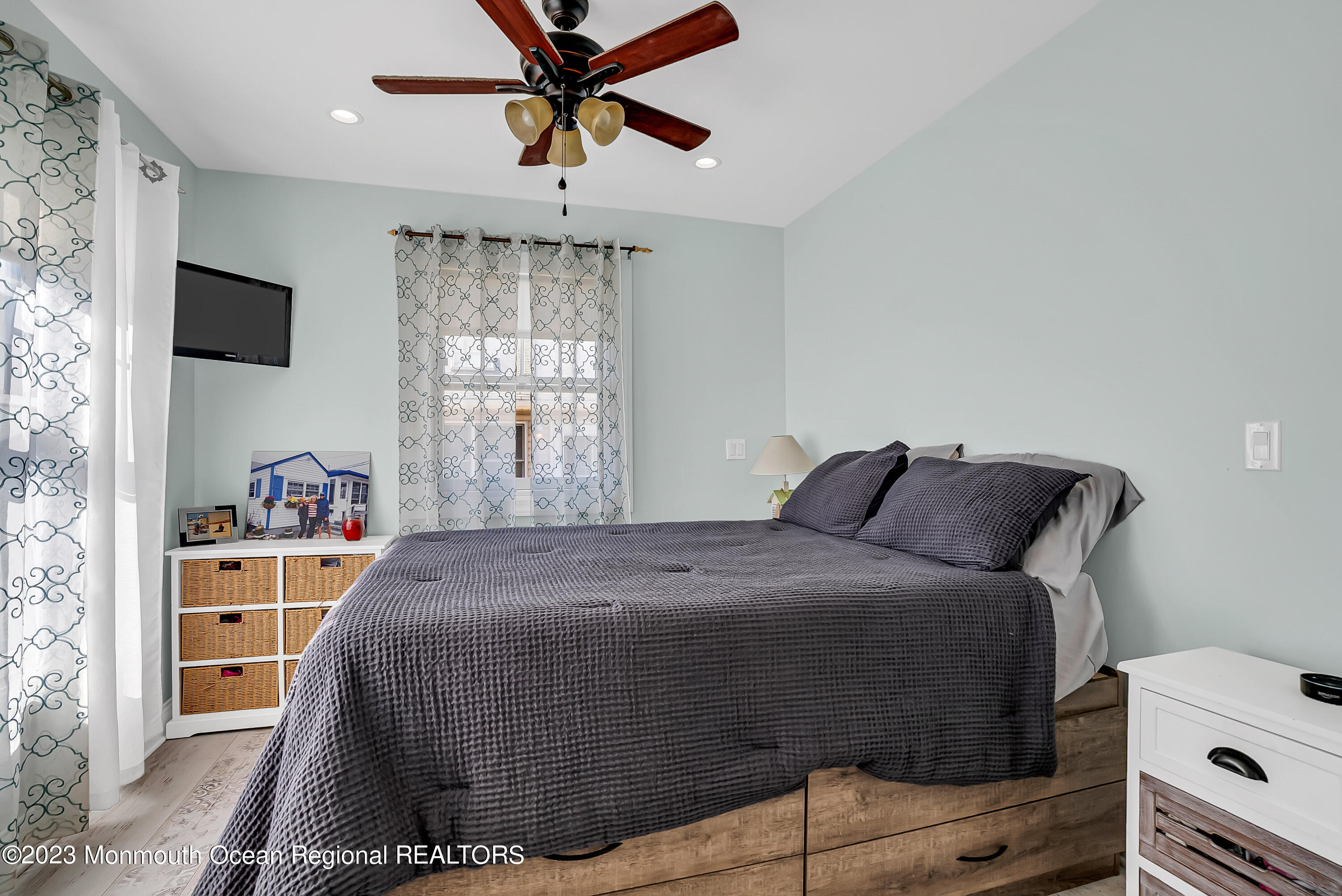 26 East Shell Way Lavallette, NJ 08735 - Photo 17 of 46 a bedroom with a bed and a window