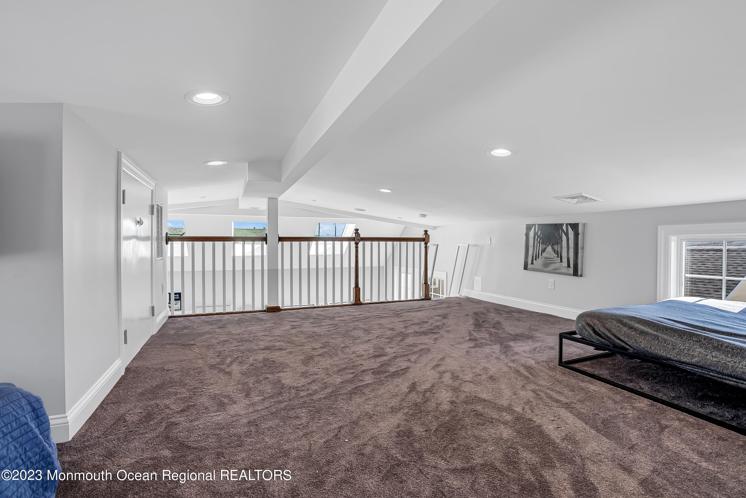 26 East Shell Way Lavallette, NJ 08735 - Photo 21 of 46 a view of a bedroom with a bed and a window