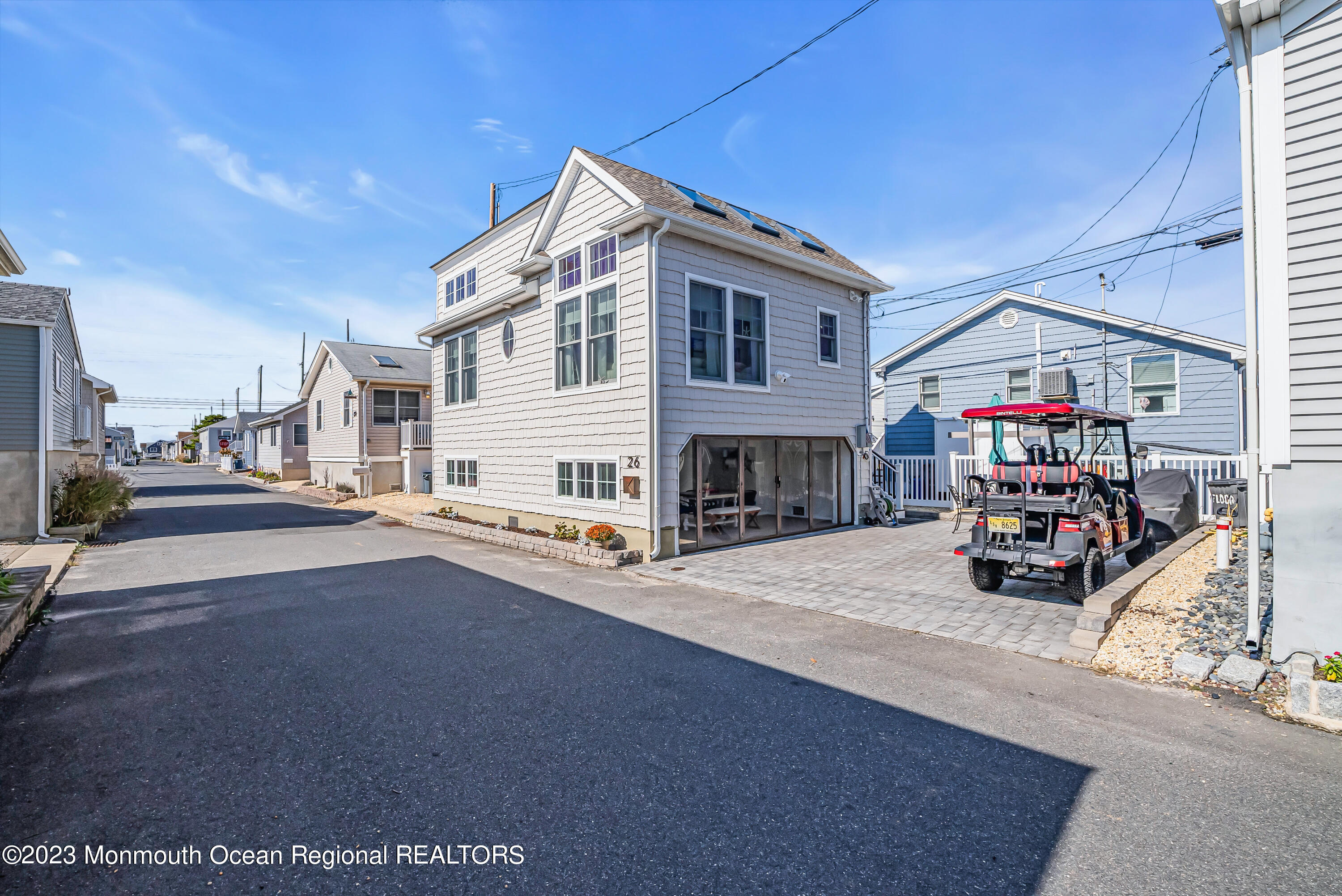 26 East Shell Way Lavallette, NJ 08735 - Photo 38 of 46 a view of house with outdoor space and parking