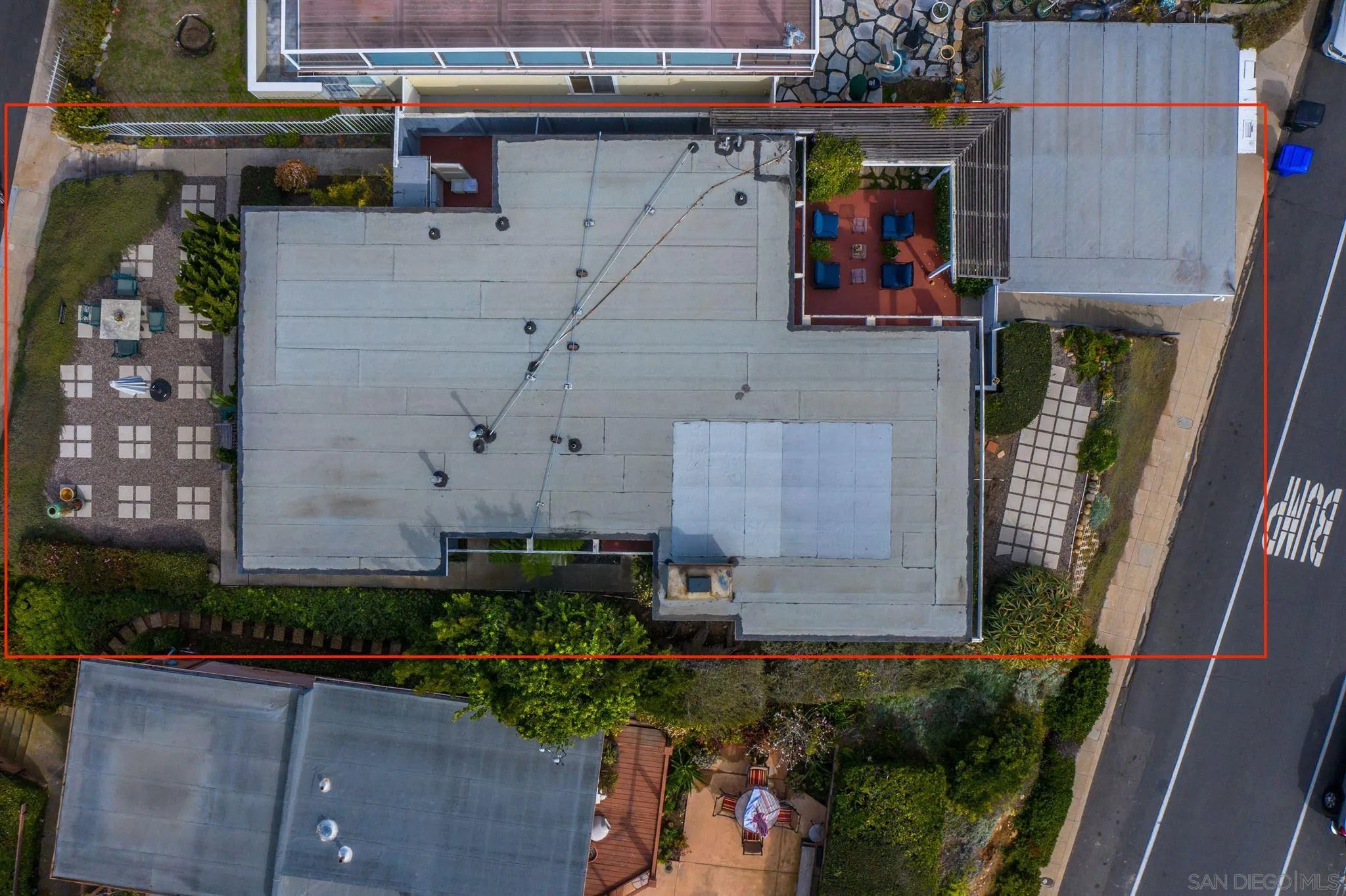 5616 Abalone Place La Jolla, CA 92037 - Photo 6 of 18 an aerial view of a house with a yard and a garage