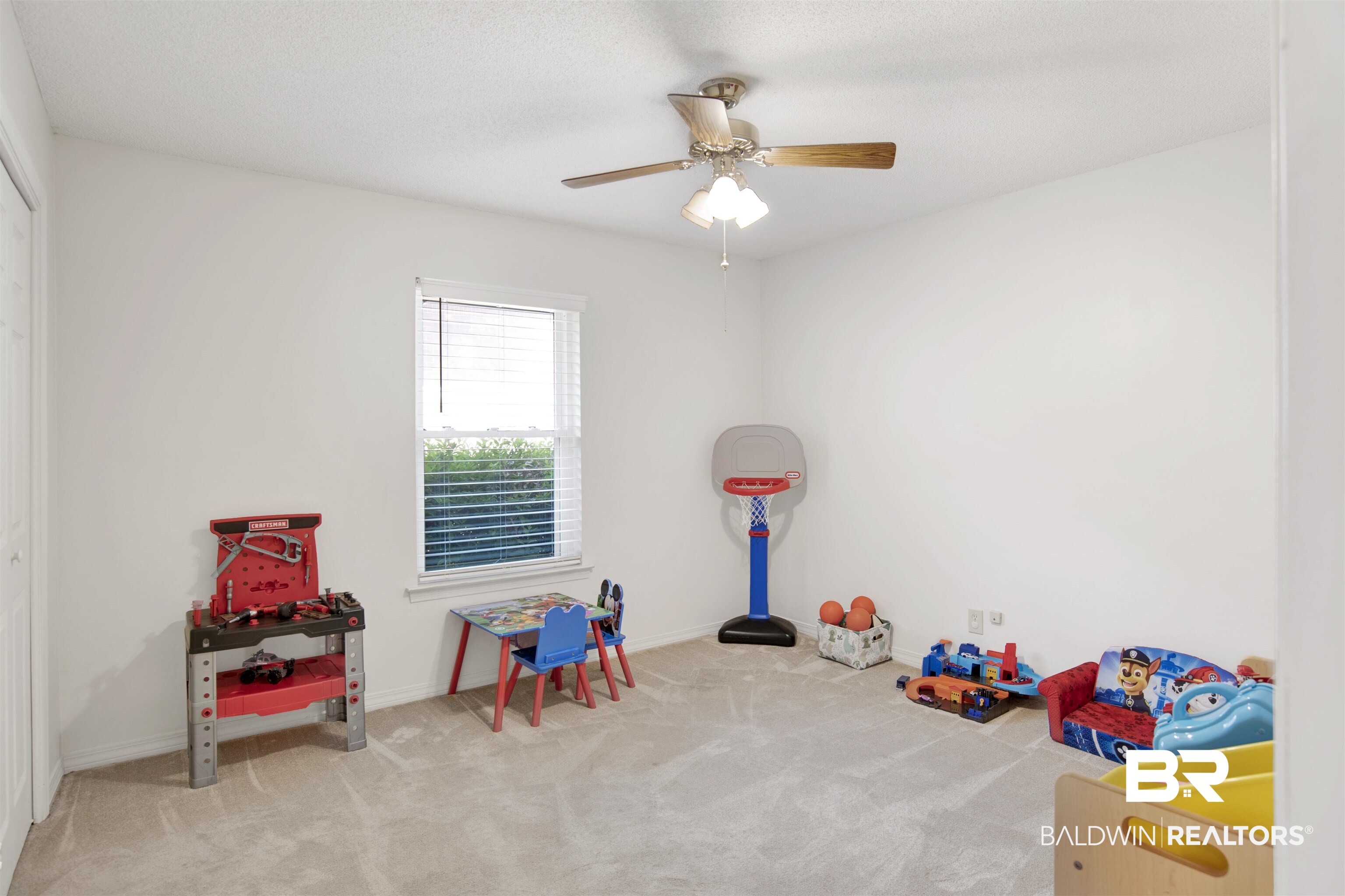 7431 Summer Court Mobile, AL 36695 - Photo 24 of 37 Recreation room with carpet flooring, ceiling fan, and baseboards