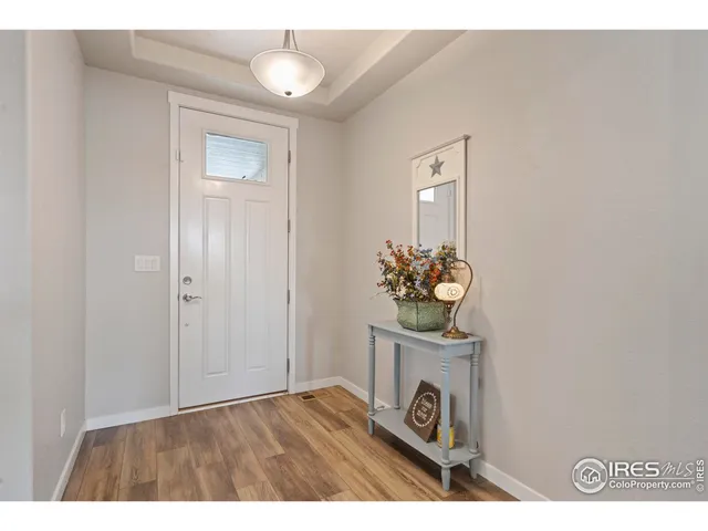 a view of a livingroom with wooden floor