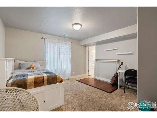 a kitchen with a sink and a refrigerator