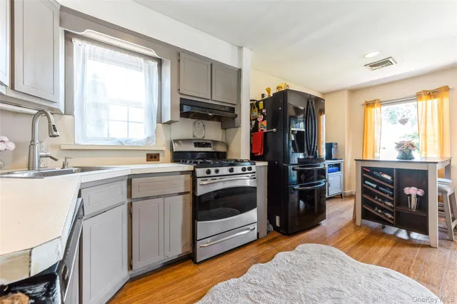 a kitchen with a window and appliances
