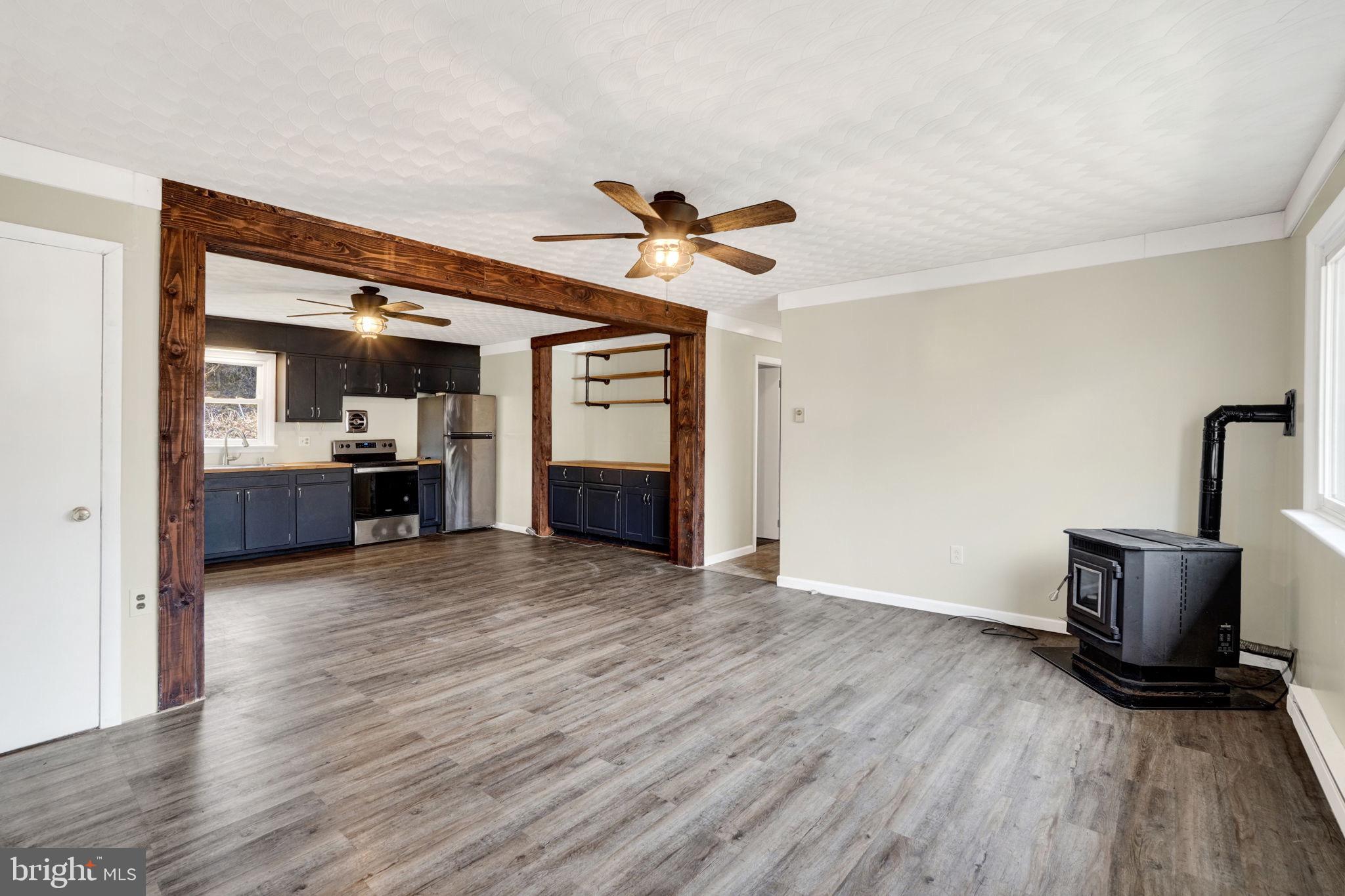 5714 Spruce Road Felton, PA 17322 - Photo 13 of 33 a view of a livingroom with furniture and wooden floor