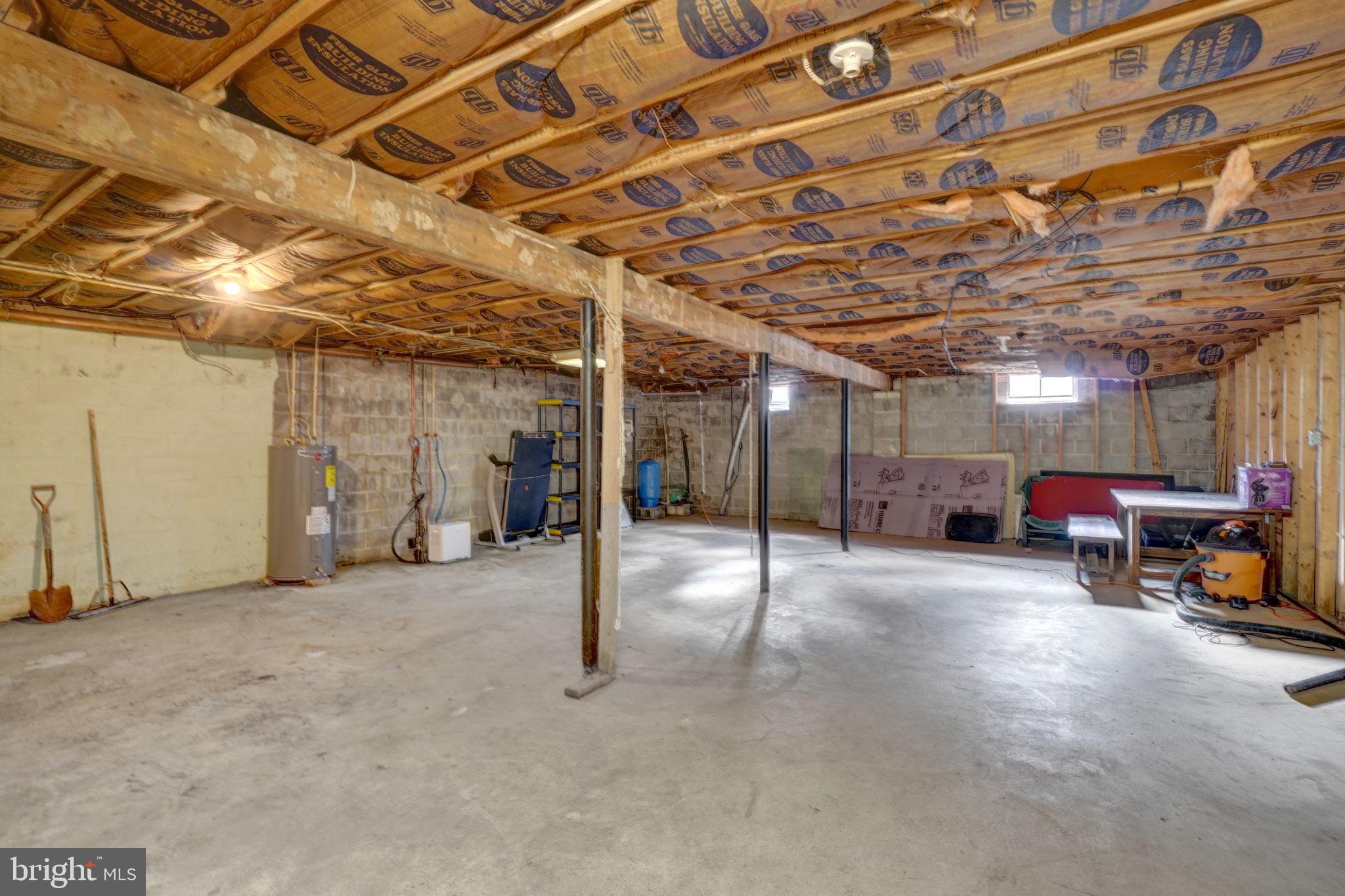 5714 Spruce Road Felton, PA 17322 - Photo 18 of 33 a view of a empty room with storage