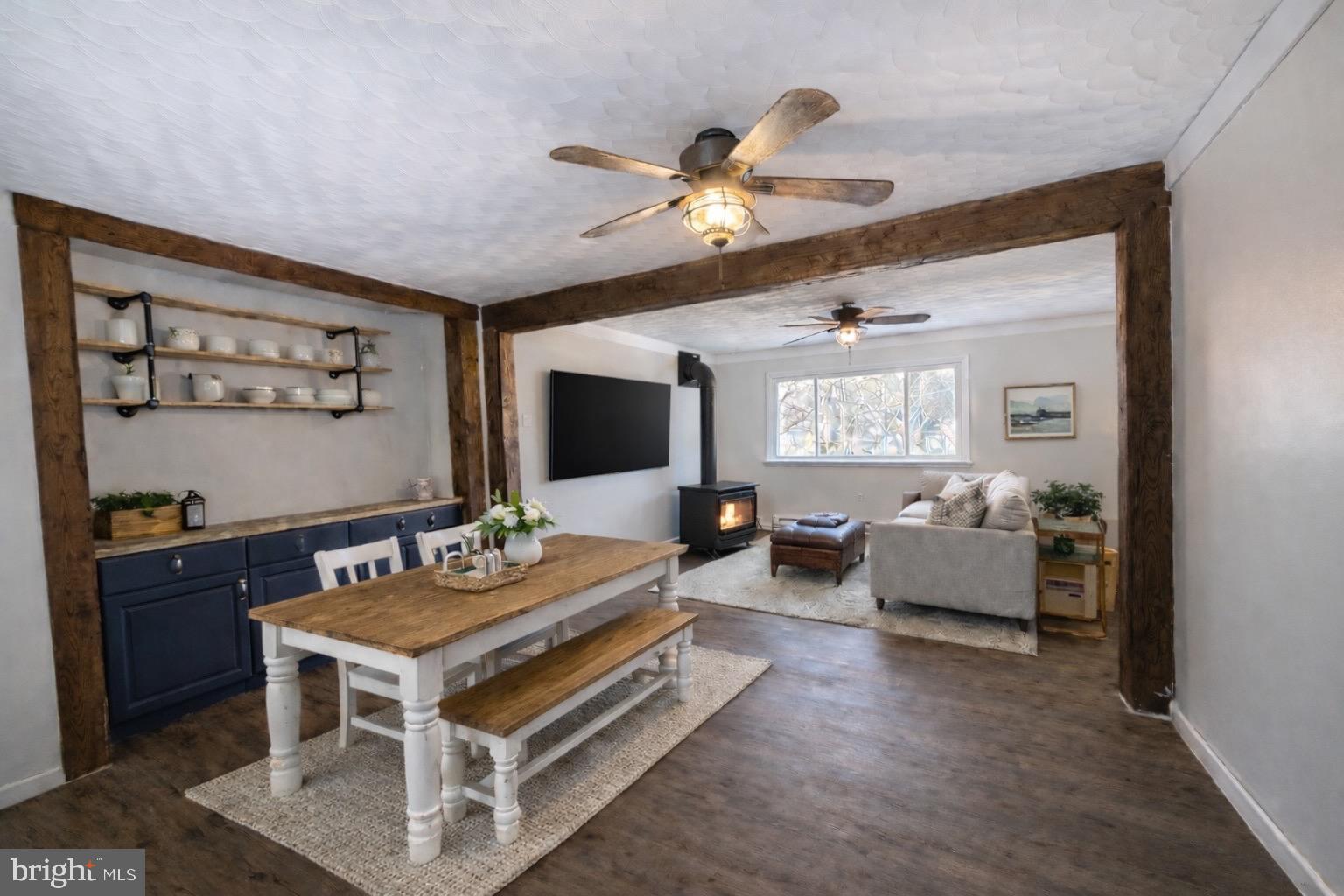 5714 Spruce Road Felton, PA 17322 - Photo 2 of 33 a living room with furniture and a flat screen tv