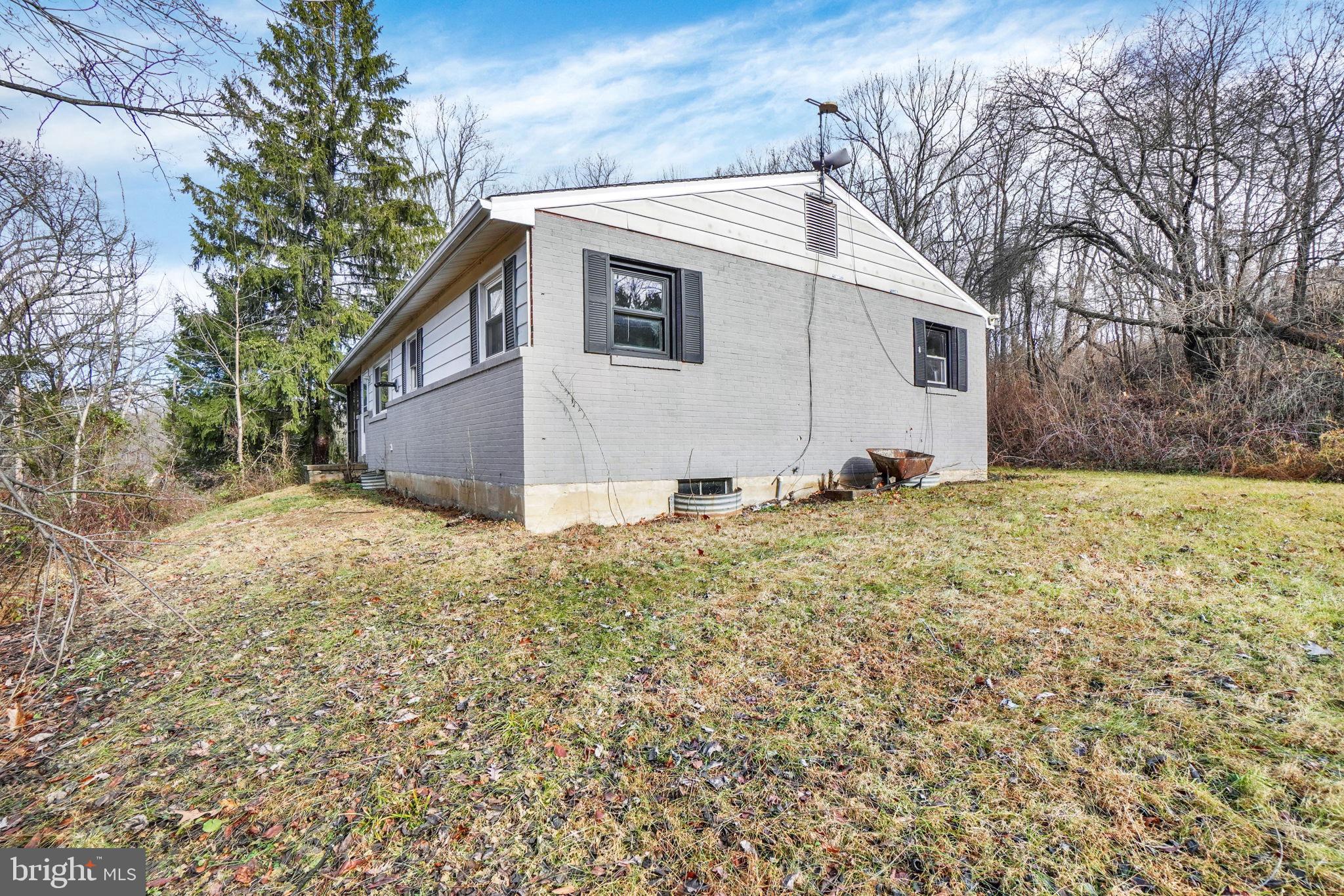 5714 Spruce Road Felton, PA 17322 - Photo 23 of 33 a view of a white house with a yard