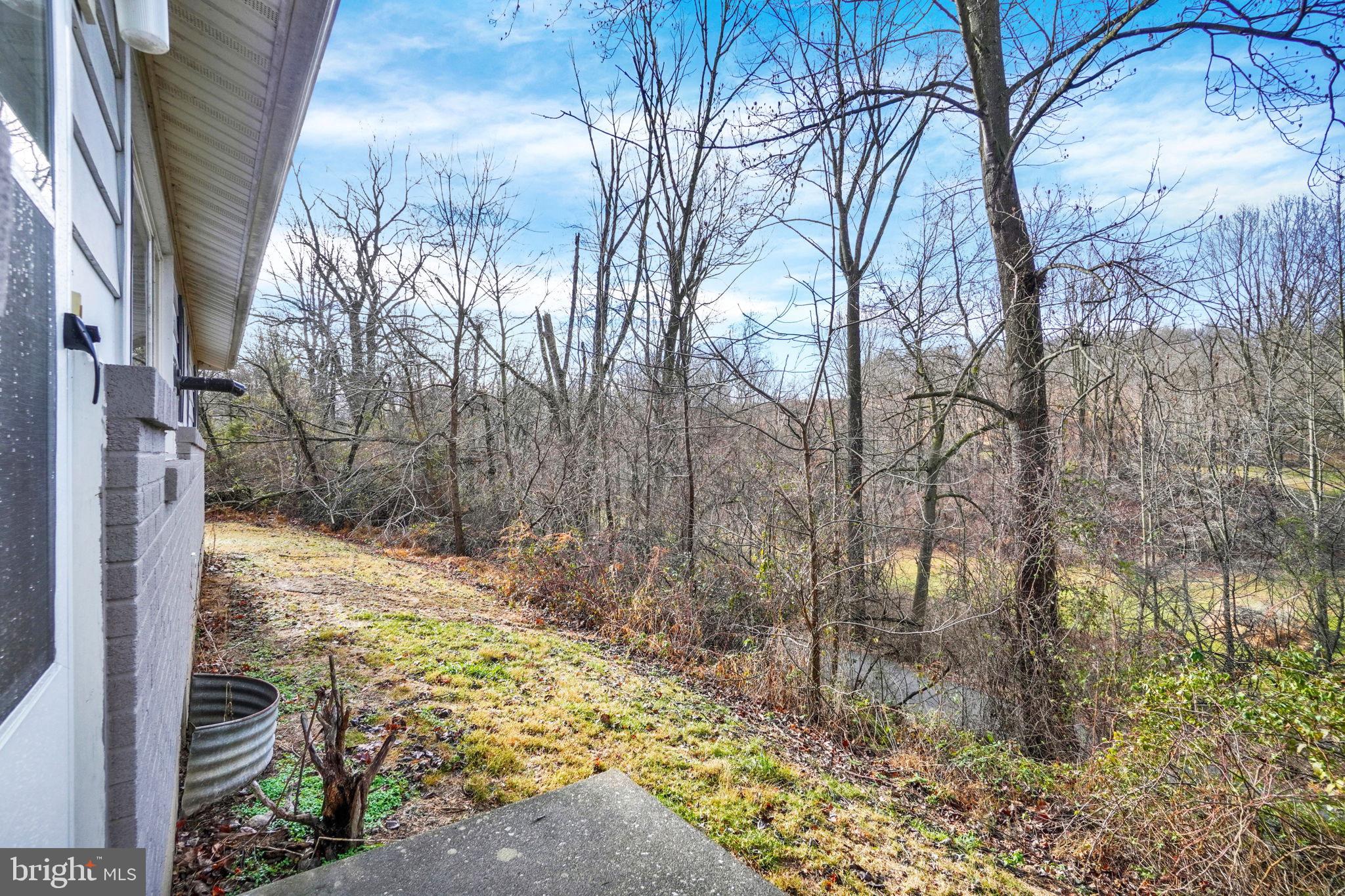 5714 Spruce Road Felton, PA 17322 - Photo 24 of 33 a view of a yard with trees