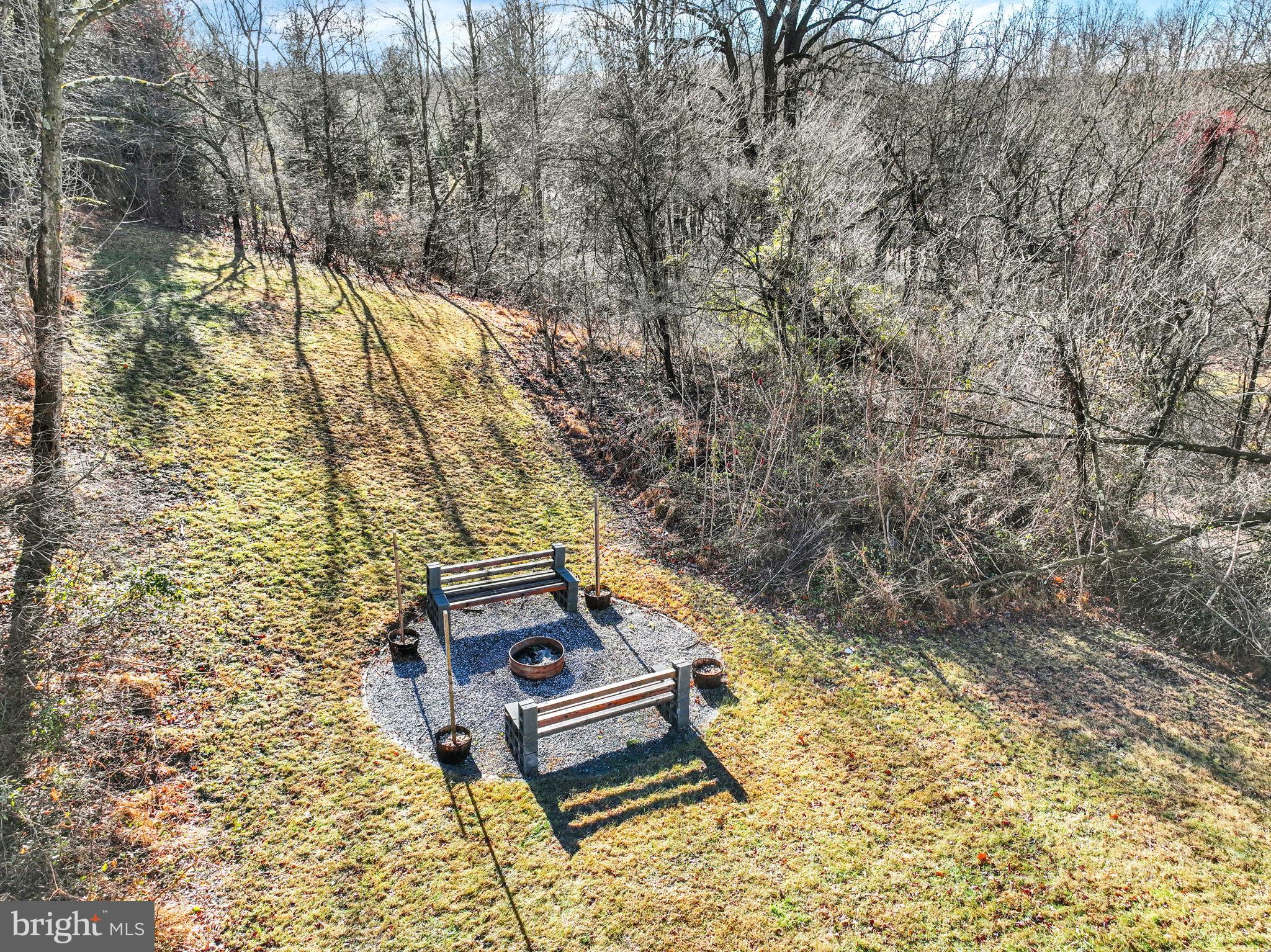 5714 Spruce Road Felton, PA 17322 - Photo 27 of 33 a backyard of a house with a yard and outdoor seating