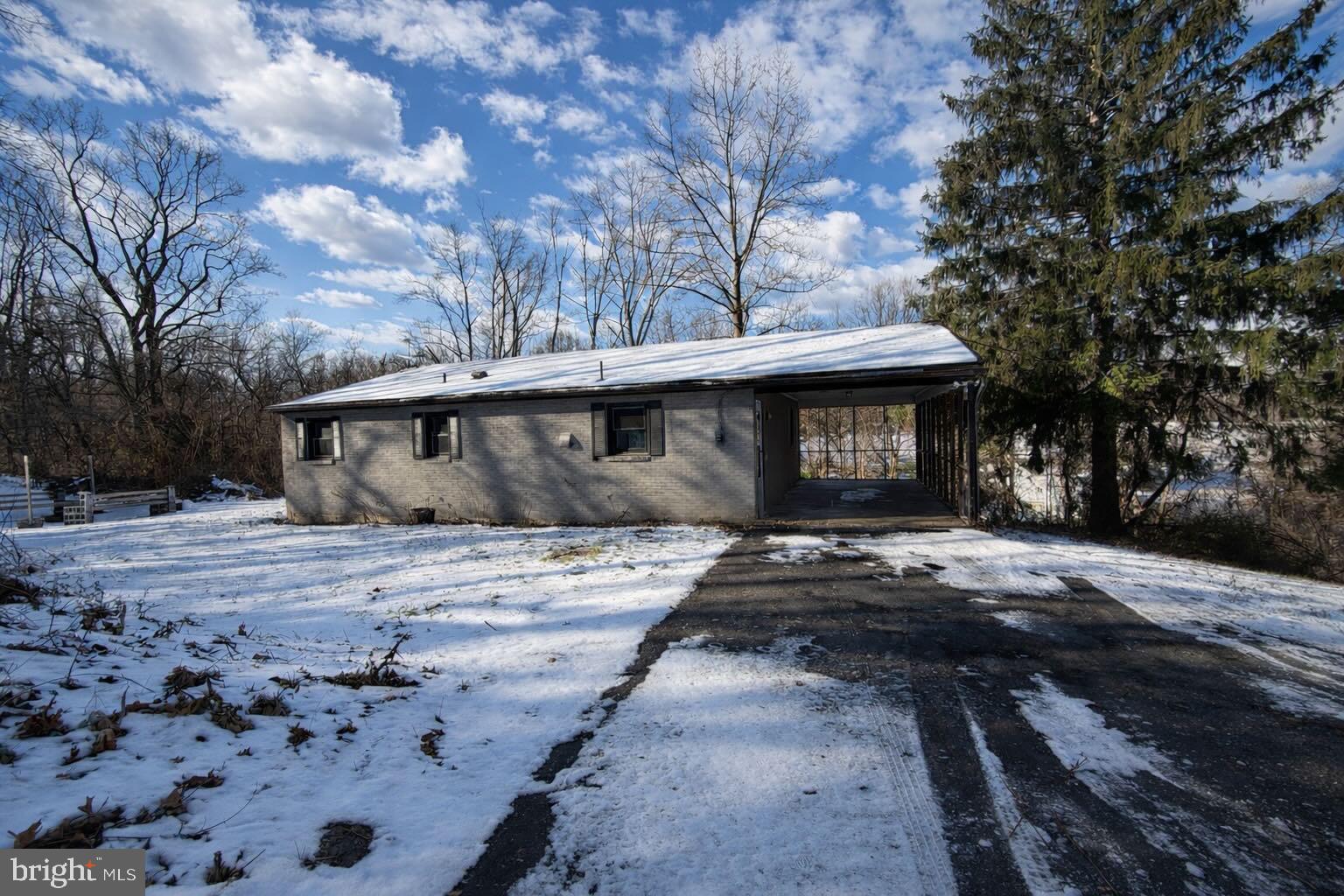 5714 Spruce Road Felton, PA 17322 - Photo 6 of 33 a front view of a house with a yard