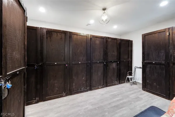 a view of water heater room with a garage