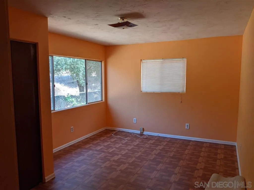 14941 Lyons Valley Road Jamul, CA 91935 - Photo 5 of 24 an empty room with a window