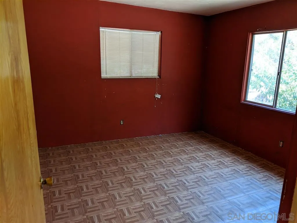14941 Lyons Valley Road Jamul, CA 91935 - Photo 6 of 24 a view of an empty room and window