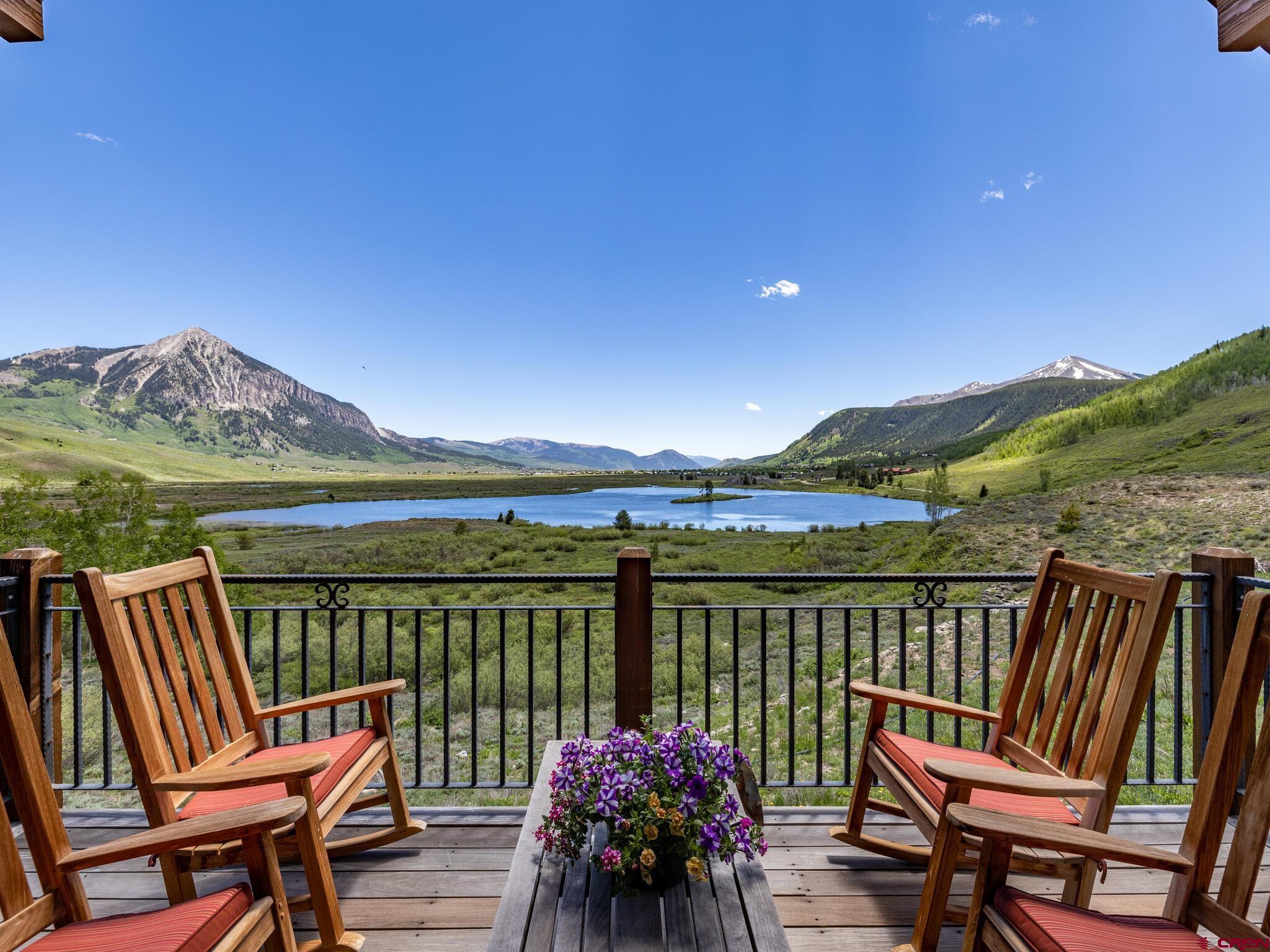 1482 Peanut Lake Road Crested Butte, CO 81224 - Photo 11 of 29 a view of a balcony with lake view and mountain view