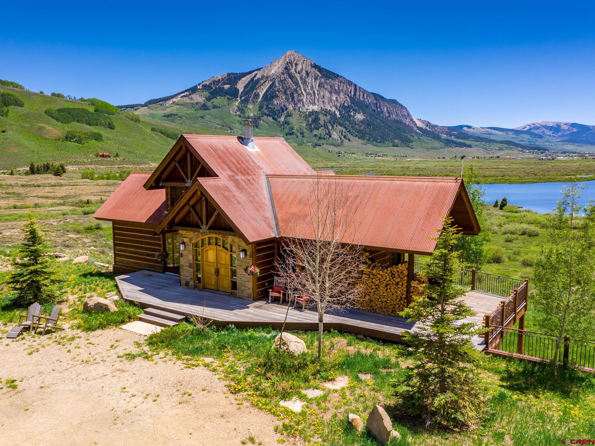 1482 Peanut Lake Road Crested Butte, CO 81224 - Photo 2 of 29 an aerial view of a house with a garden