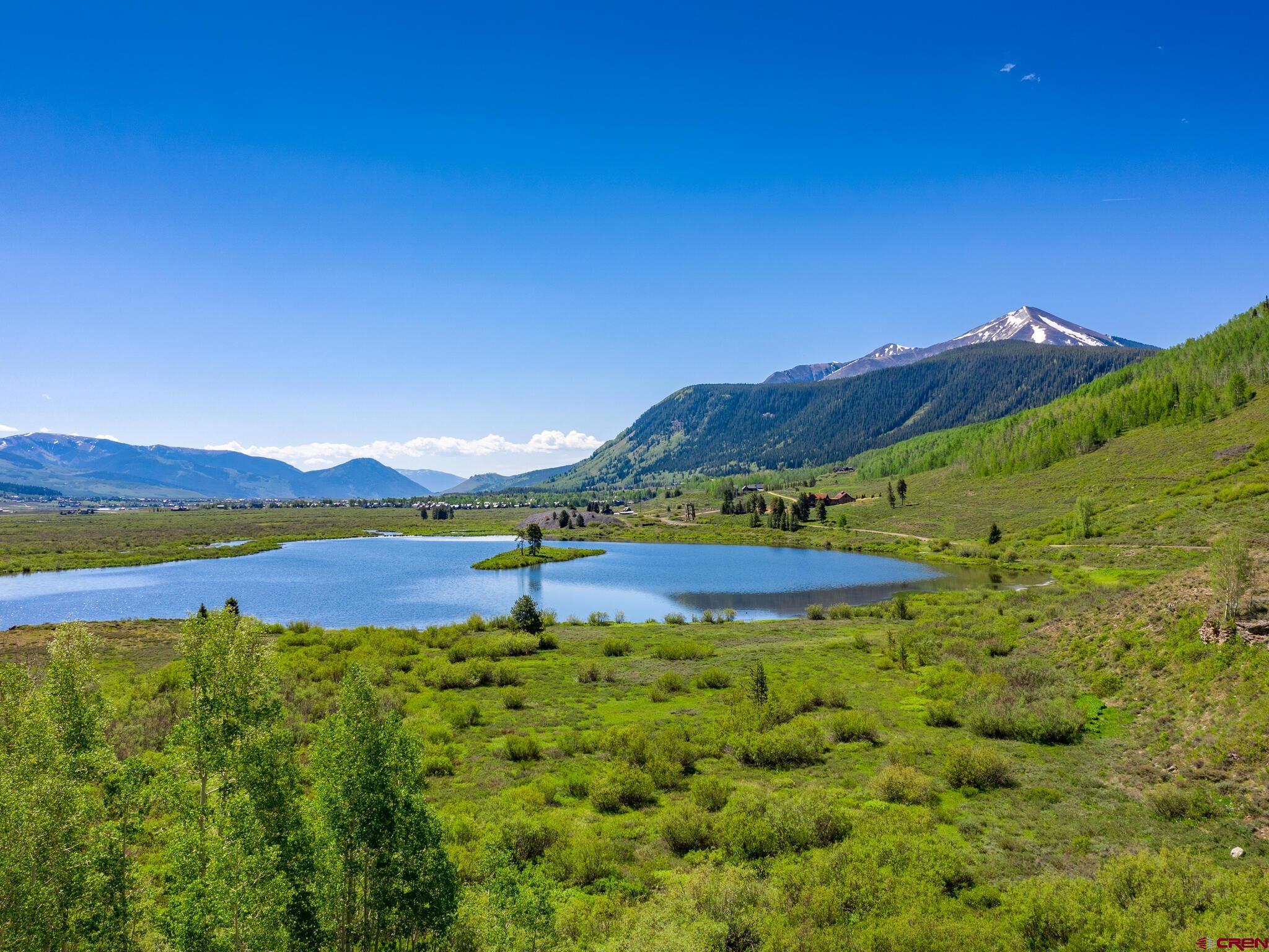 1482 Peanut Lake Road Crested Butte, CO 81224 - Photo 21 of 29 a view of a lake with a mountain in the background