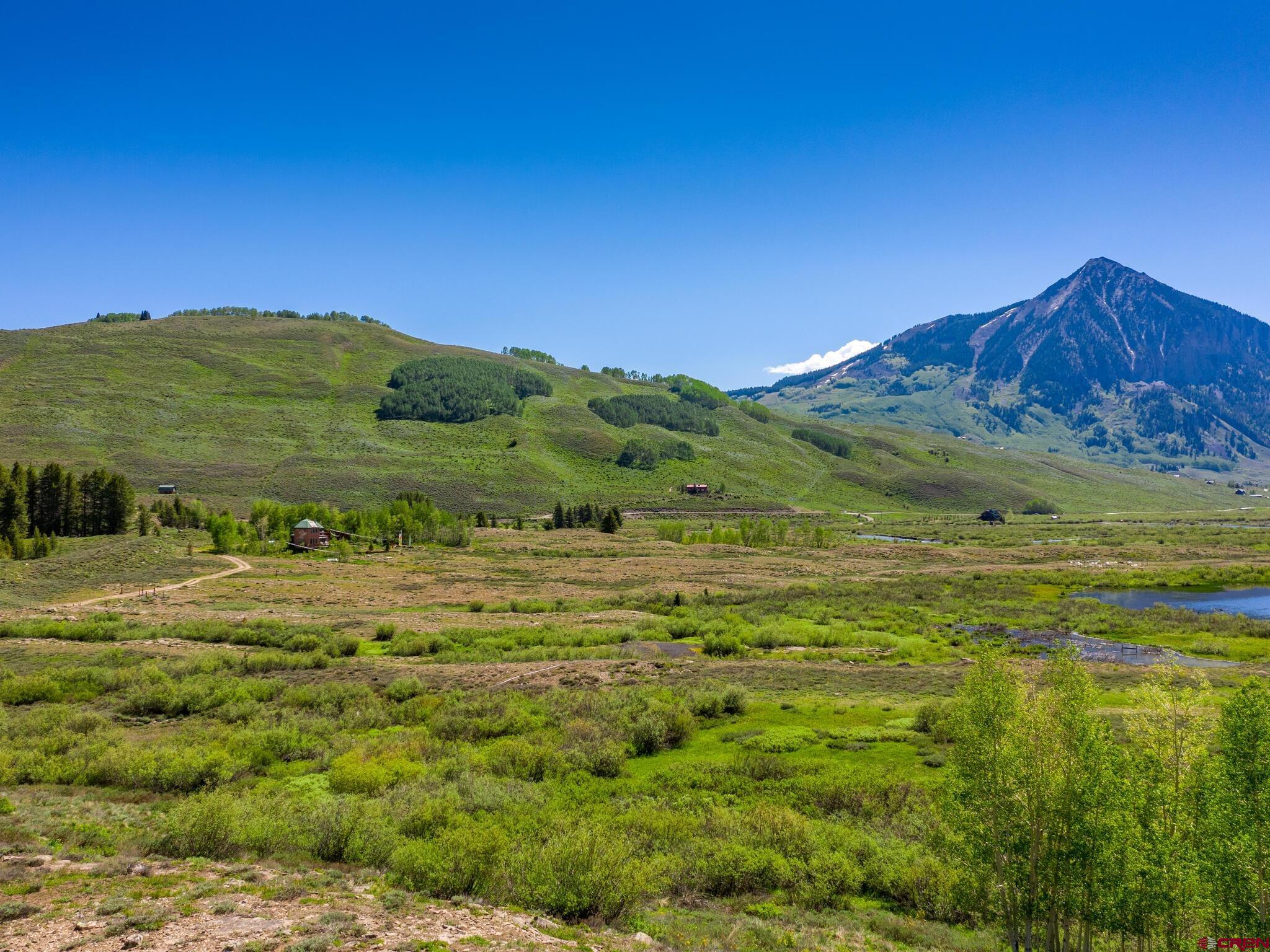 1482 Peanut Lake Road Crested Butte, CO 81224 - Photo 22 of 29 a view of an ocean from a yard