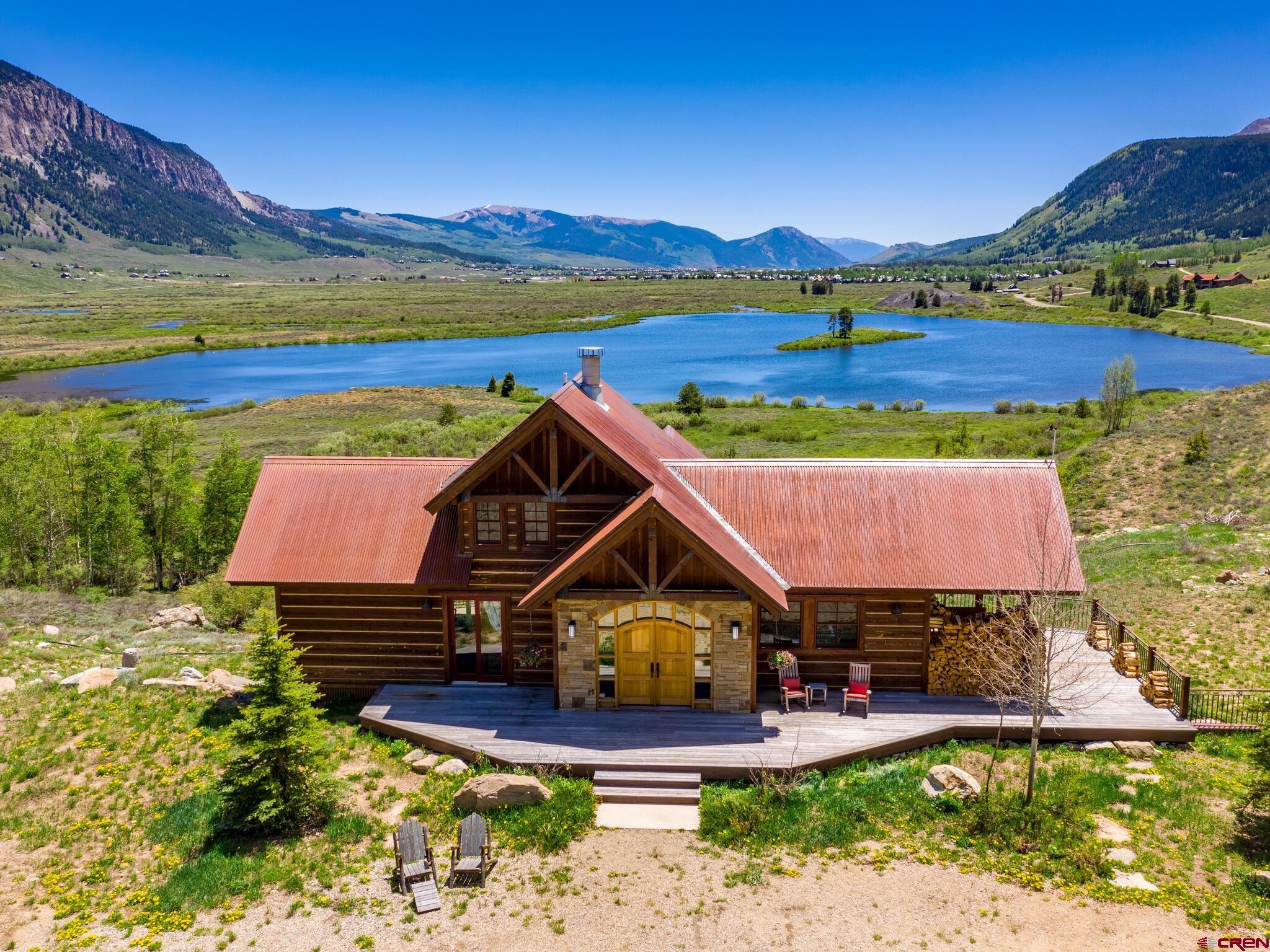 1482 Peanut Lake Road Crested Butte, CO 81224 - Photo 3 of 29 an aerial view of a house with a garden
