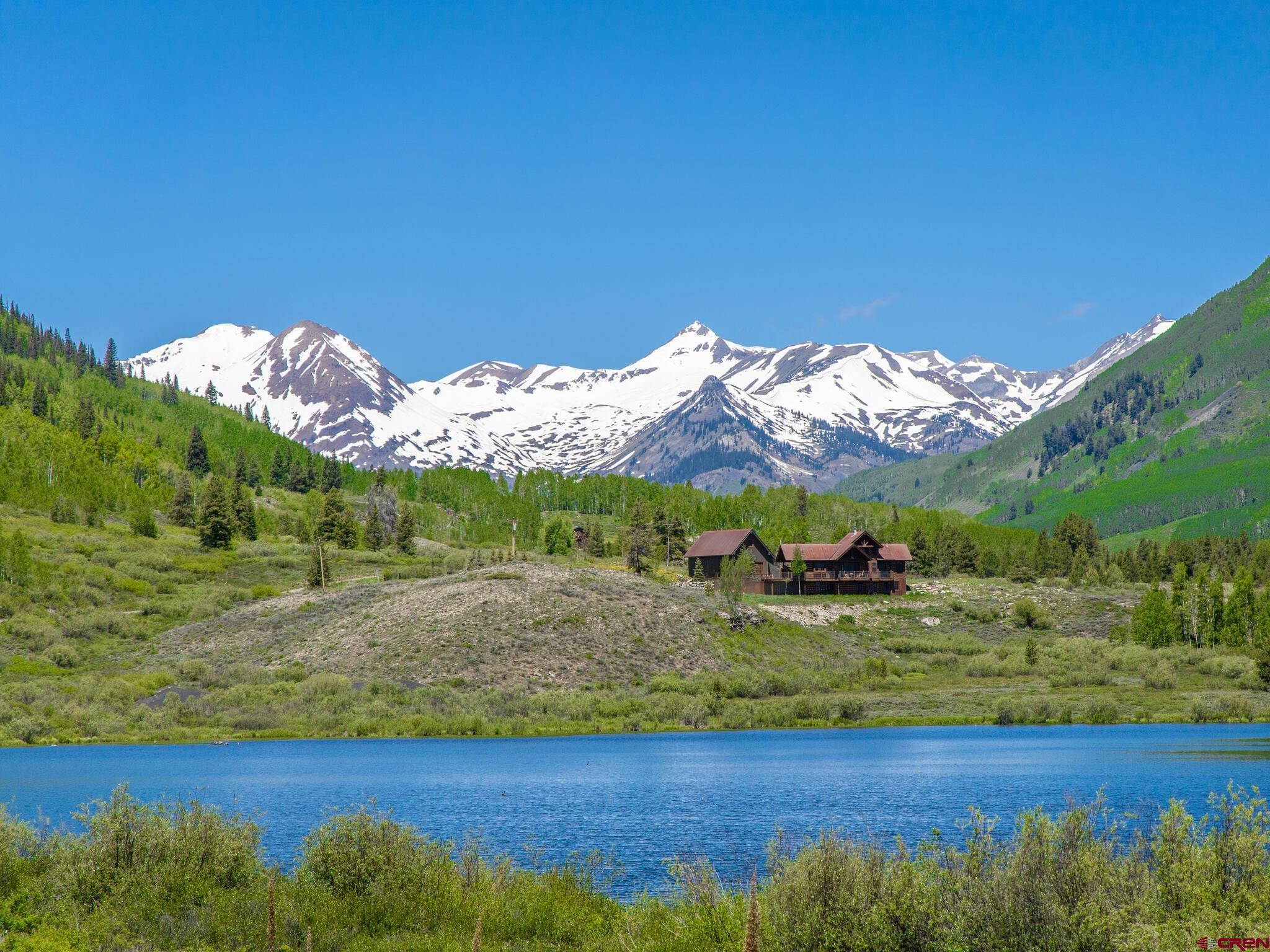 1482 Peanut Lake Road Crested Butte, CO 81224 - Photo 6 of 29 a view of a lake with mountain in the background