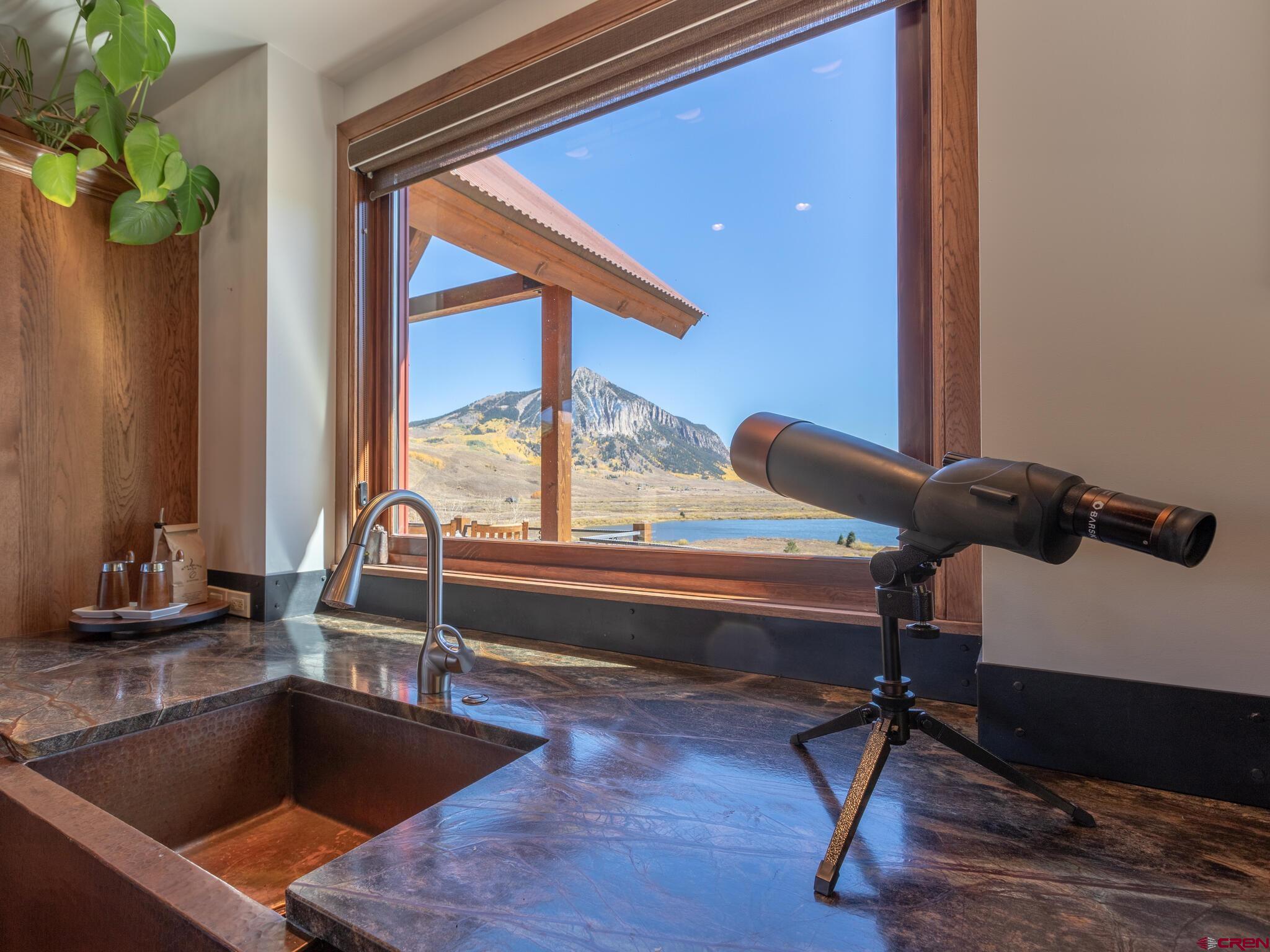 1482 Peanut Lake Road Crested Butte, CO 81224 - Photo 10 of 29 a kitchen with a sink and a large window