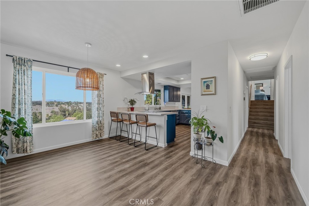 1864 Winterwarm Drive Fallbrook, CA 92028 - Photo 13 of 48 a view of kitchen with furniture and wooden floor