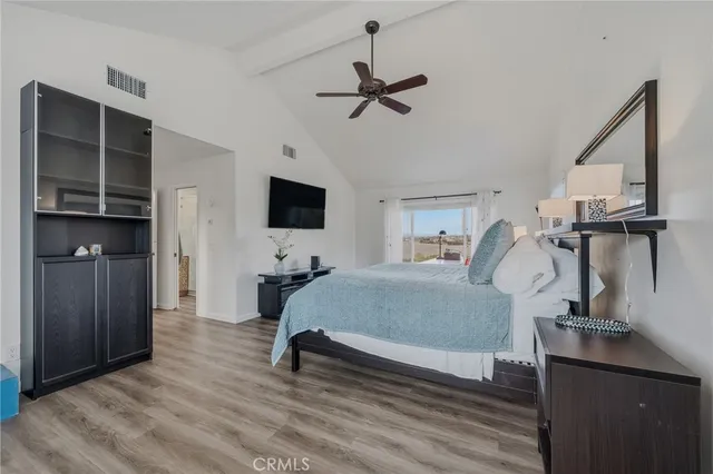 a view of a swimming pool with a lounge chair