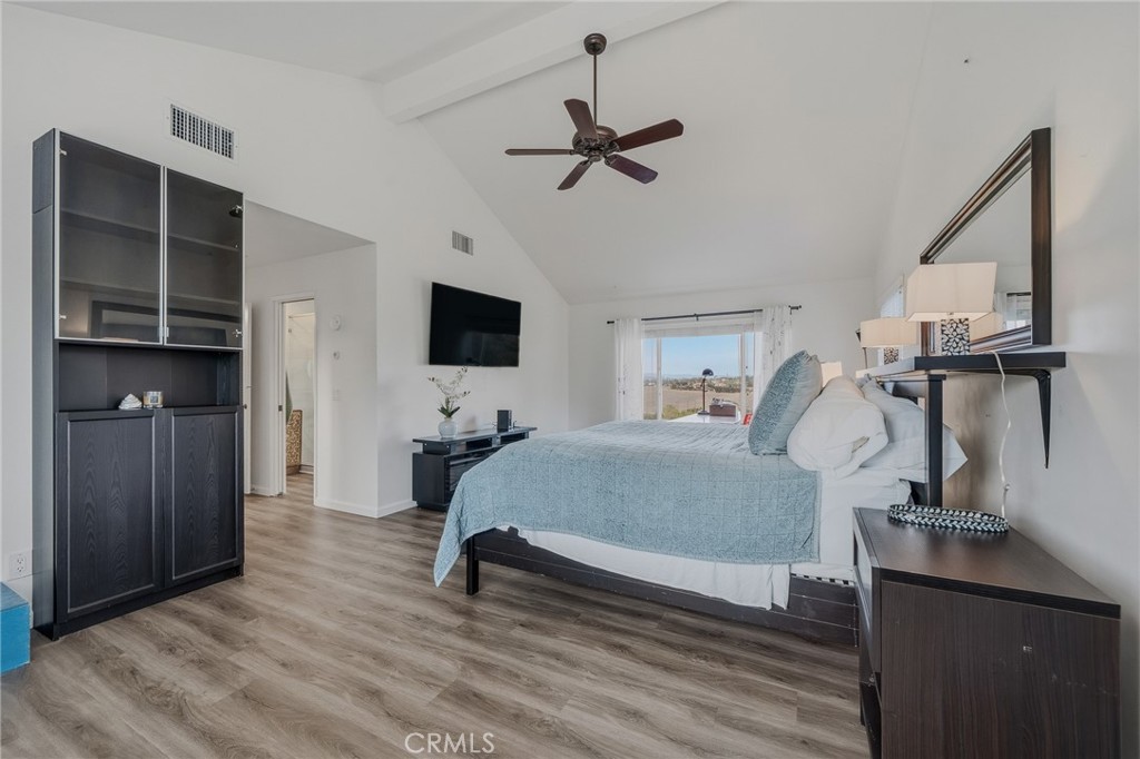 1864 Winterwarm Drive Fallbrook, CA 92028 - Photo 20 of 48 a bed room with a bed and a flat tv screen