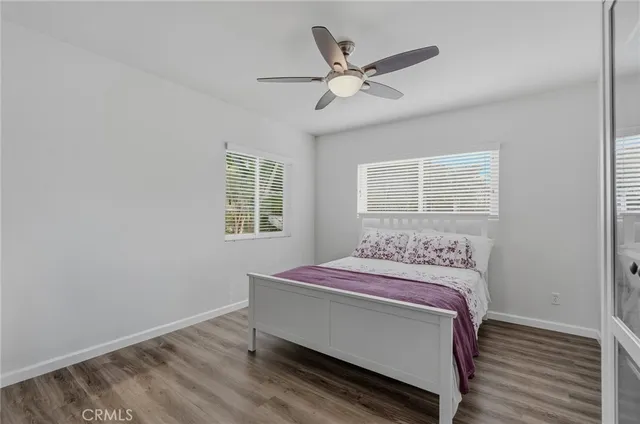 an aerial view of a house with a yard basket ball court and outdoor seating