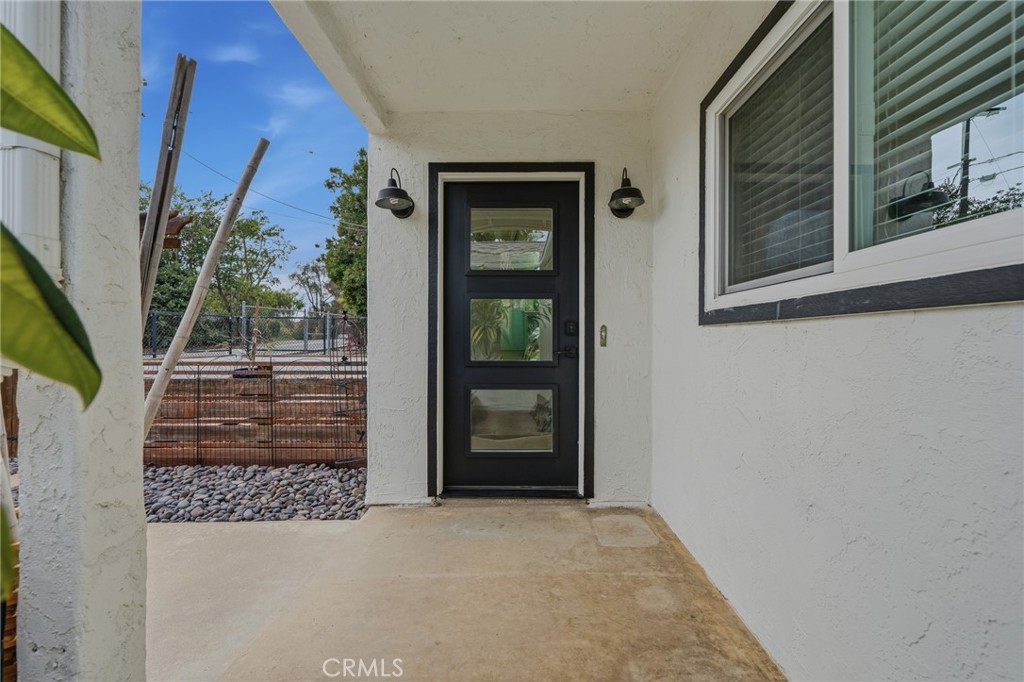1864 Winterwarm Drive Fallbrook, CA 92028 - Photo 8 of 48 a view of a door and wooden floor