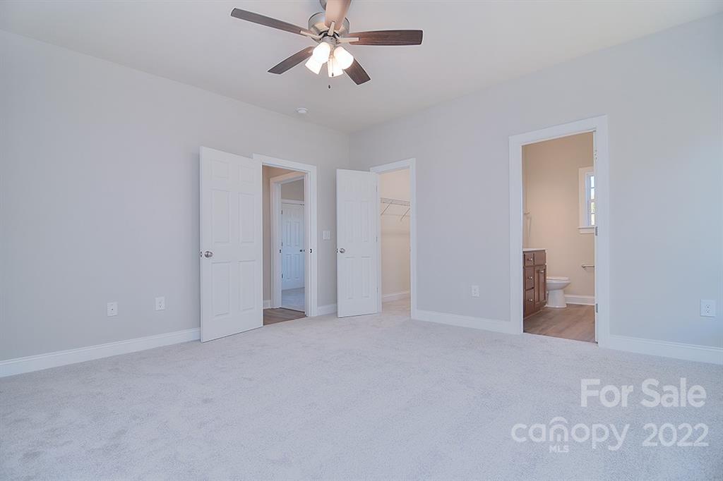 288 Ella Drive, Unit 101 Locust, NC 28097 - Photo 23 of 28 a view of an empty room