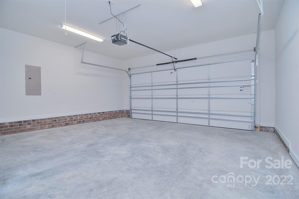 288 Ella Drive, Unit 101 Locust, NC 28097 - Photo 28 of 28 a view of a garage
