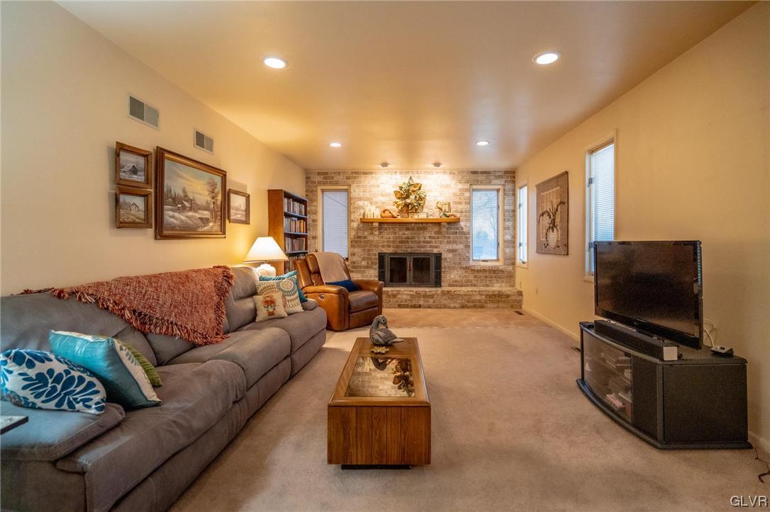 1540 Hidden Valley Road Allentown, PA 18103 - Photo 11 of 42 a living room with furniture and a flat screen tv