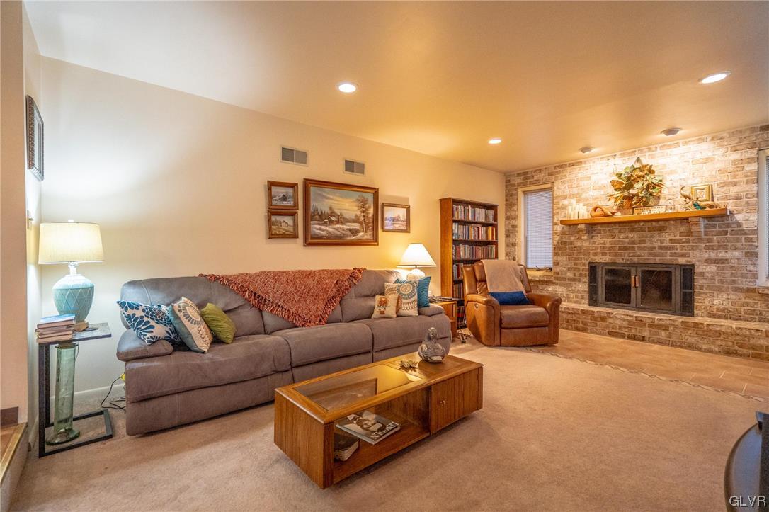 1540 Hidden Valley Road Allentown, PA 18103 - Photo 13 of 42 a living room with furniture and a fireplace