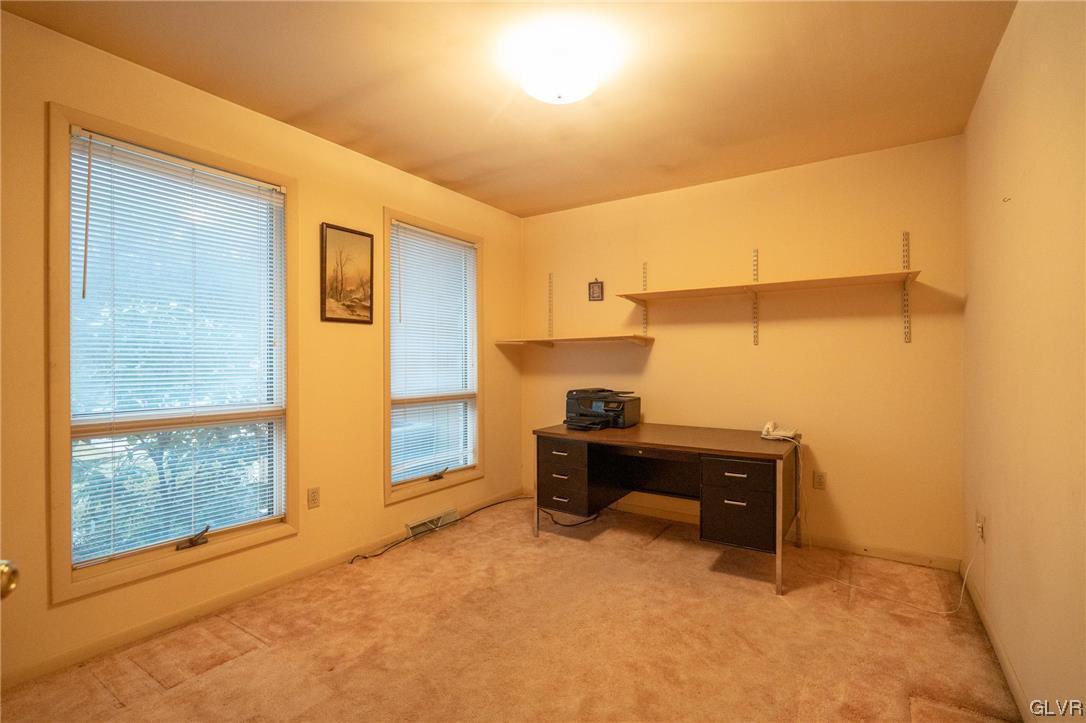 1540 Hidden Valley Road Allentown, PA 18103 - Photo 20 of 42 a room with a desk and a window