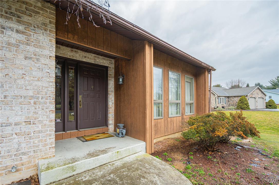 1540 Hidden Valley Road Allentown, PA 18103 - Photo 2 of 42 a front view of a house with a yard