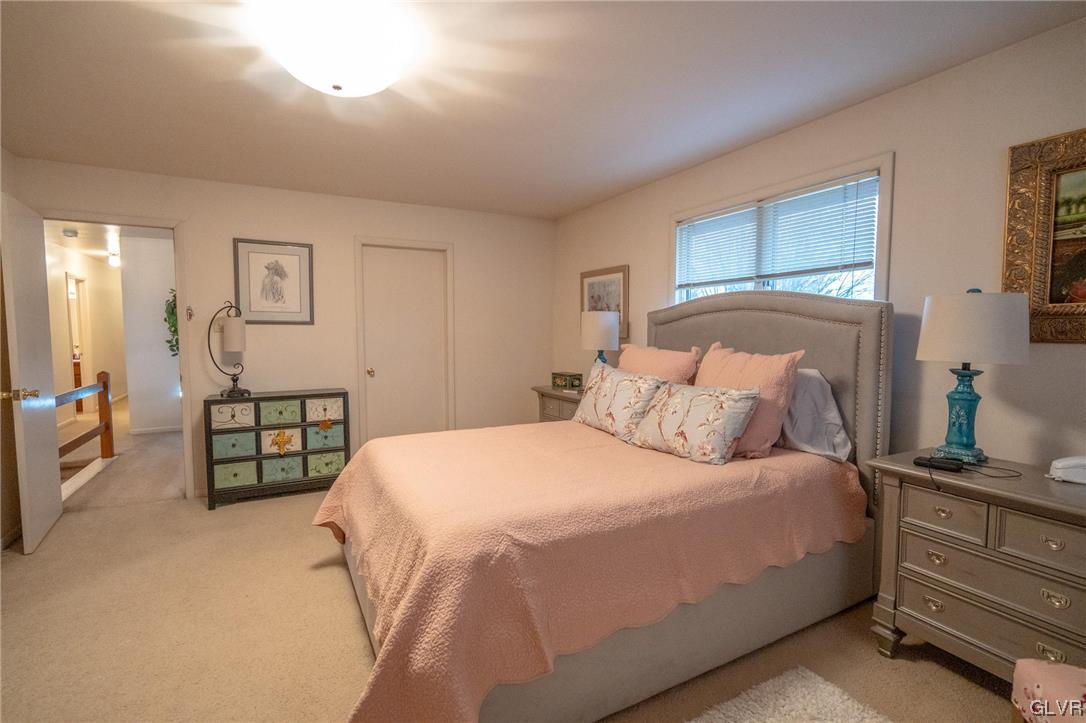 1540 Hidden Valley Road Allentown, PA 18103 - Photo 25 of 42 a bedroom with a bed and dresser