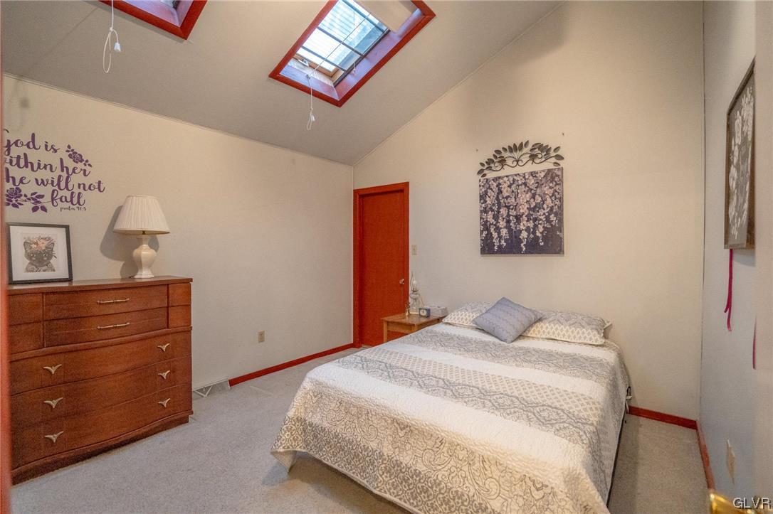 1540 Hidden Valley Road Allentown, PA 18103 - Photo 29 of 42 a bedroom with a bed and painting on the wall