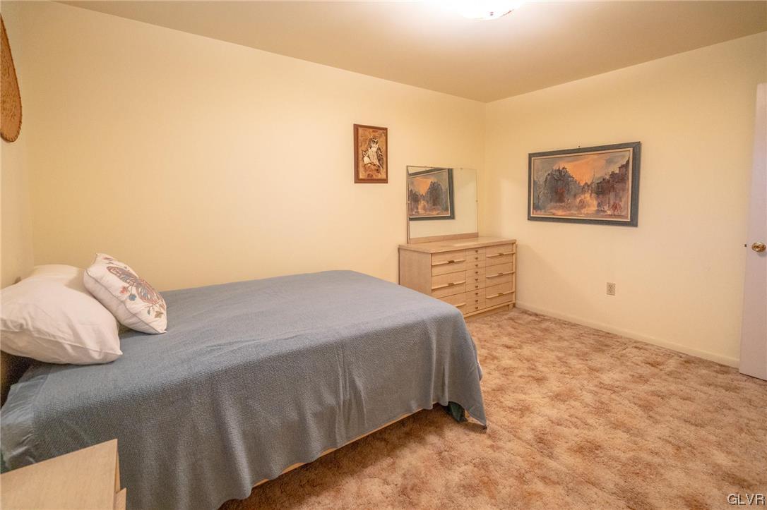 1540 Hidden Valley Road Allentown, PA 18103 - Photo 30 of 42 a bedroom with a bed and a cabinets