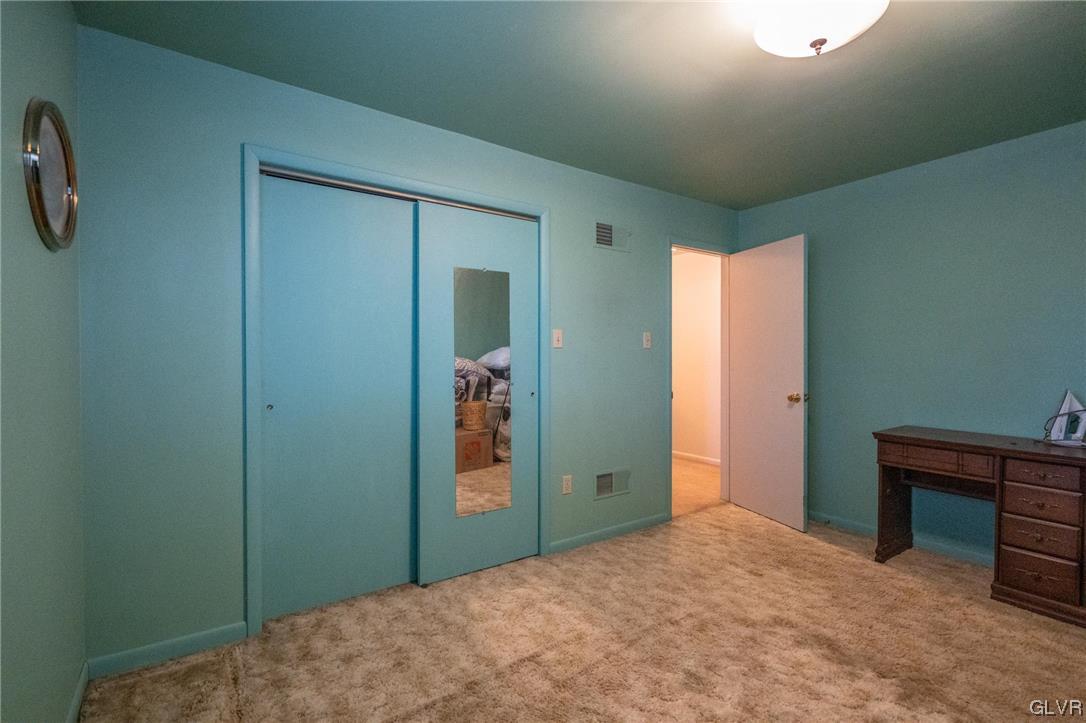 1540 Hidden Valley Road Allentown, PA 18103 - Photo 32 of 42 a bedroom with a bed and a dresser