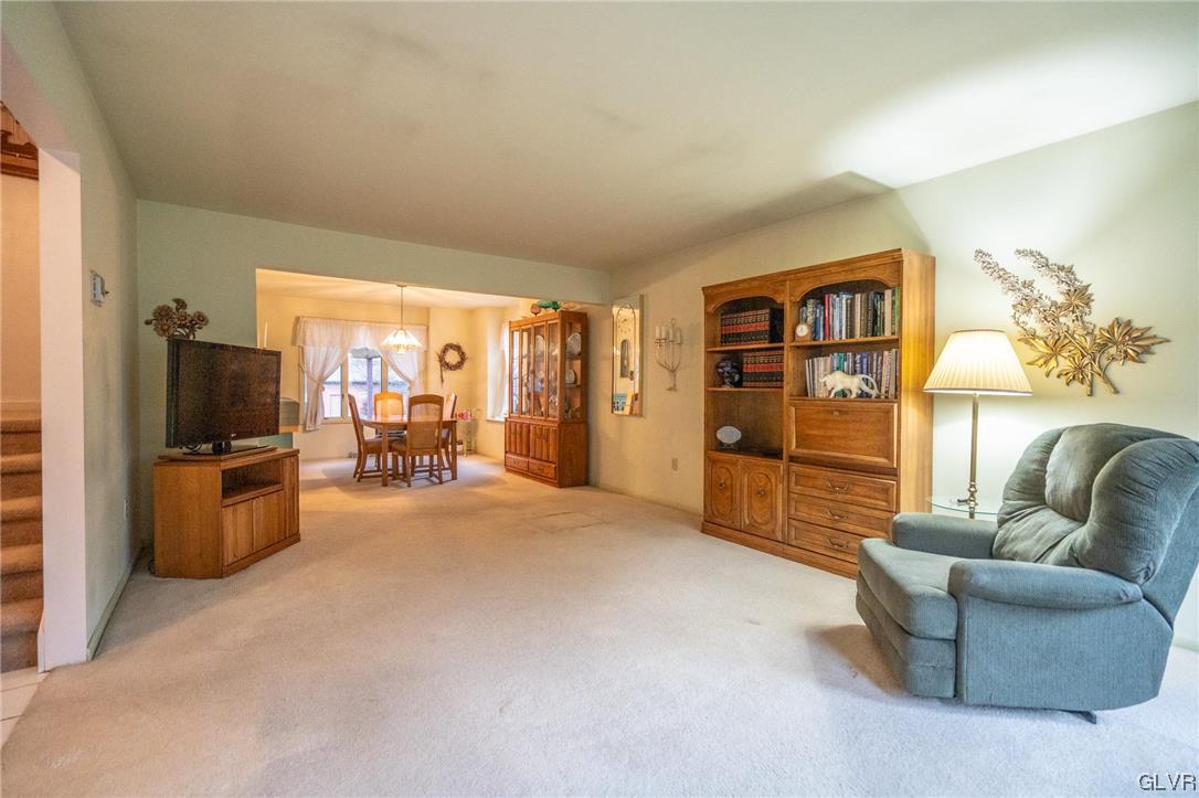 1540 Hidden Valley Road Allentown, PA 18103 - Photo 7 of 42 a living room with furniture and a flat screen tv