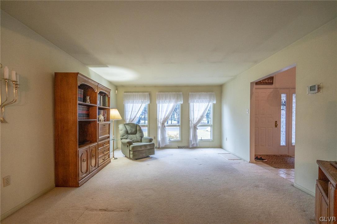 1540 Hidden Valley Road Allentown, PA 18103 - Photo 8 of 42 a living room with furniture and a window