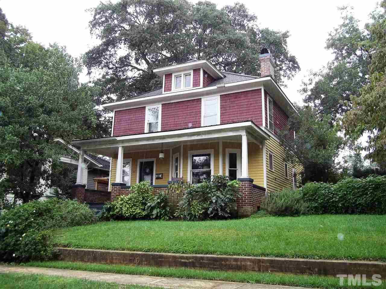 507 Cleveland Street Raleigh, NC 27605 - Photo 2 of 25 a front view of a house with a garden